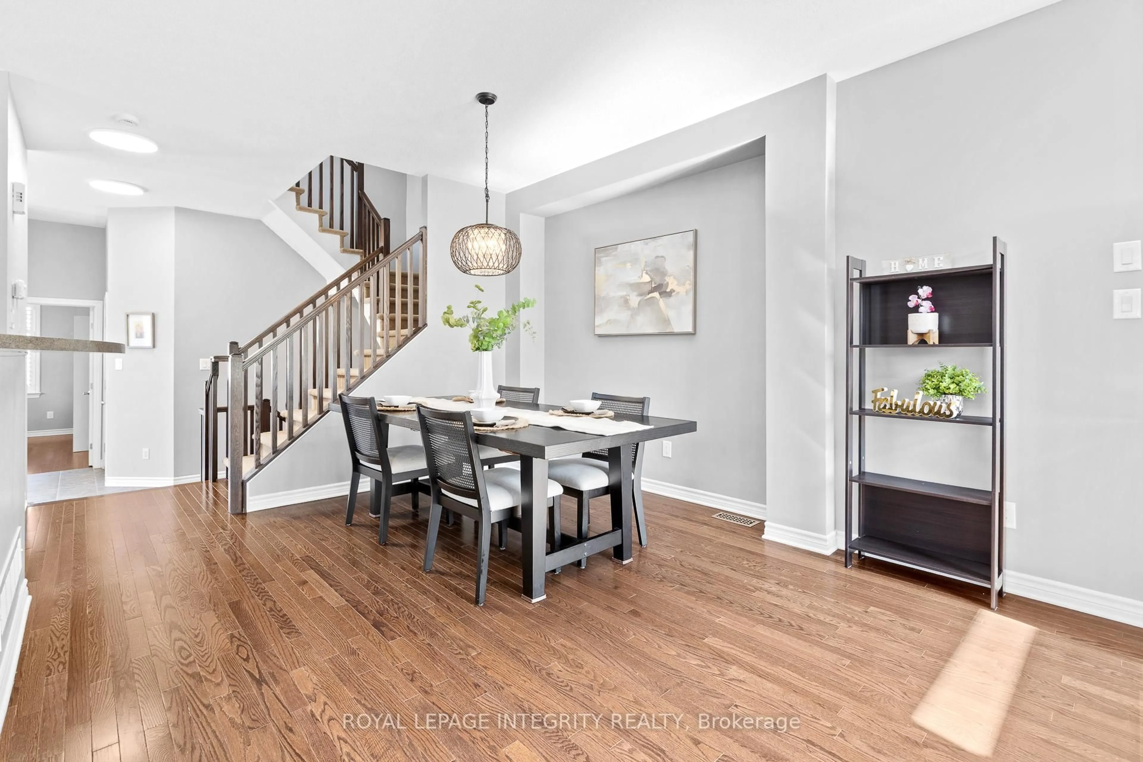 Dining room, wood/laminate floor for 179 Flat Sedge Cres, Ottawa Ontario K1T 0G9