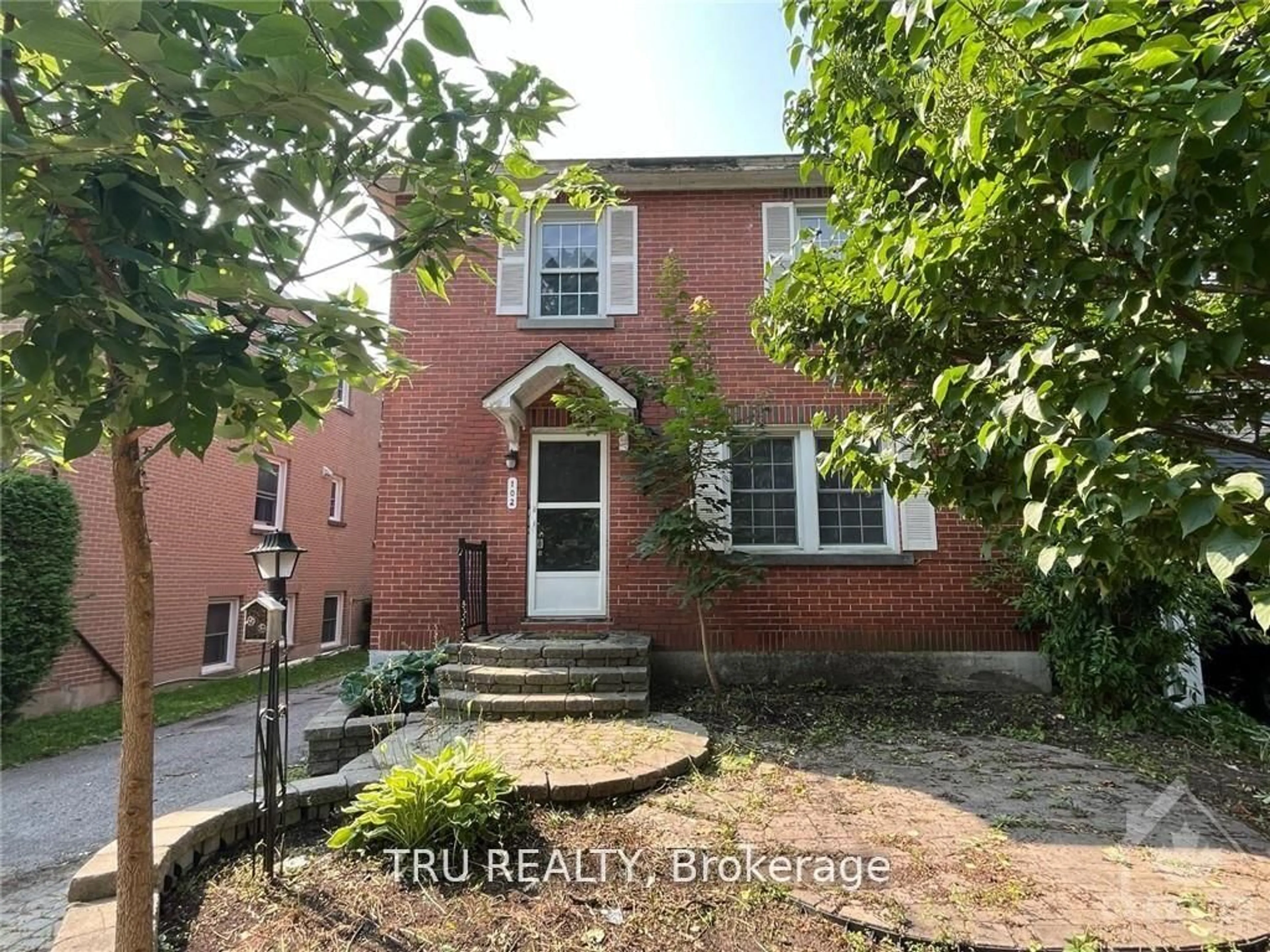 Home with brick exterior material, street for 102 Putman Ave, Ottawa Ontario K1M 1Z6