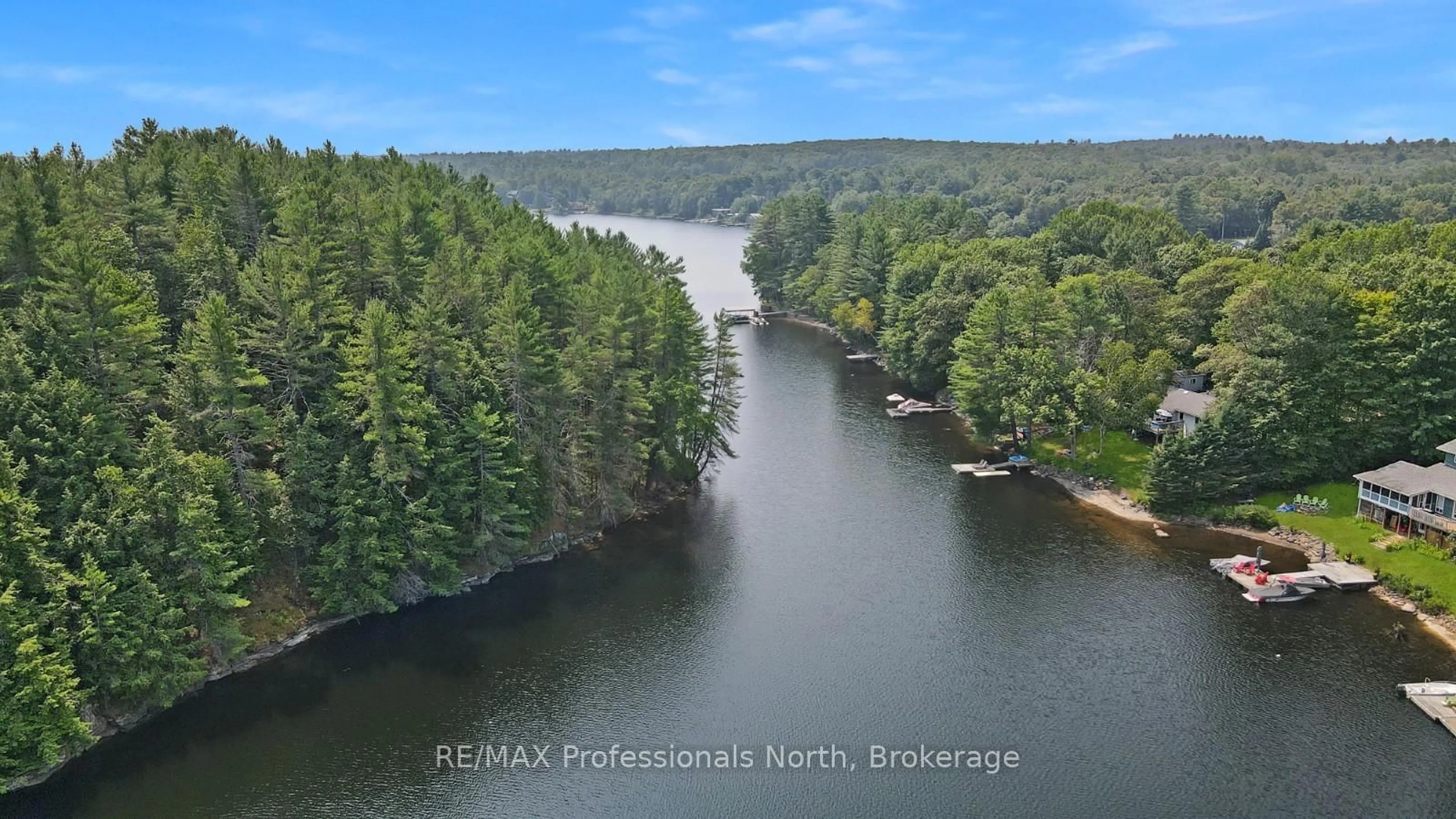 A pic from outside/outdoor area/front of a property/back of a property/a pic from drone, water/lake/river/ocean view for 1111 Jones Rd, Algonquin Highlands Ontario K0M 1S0
