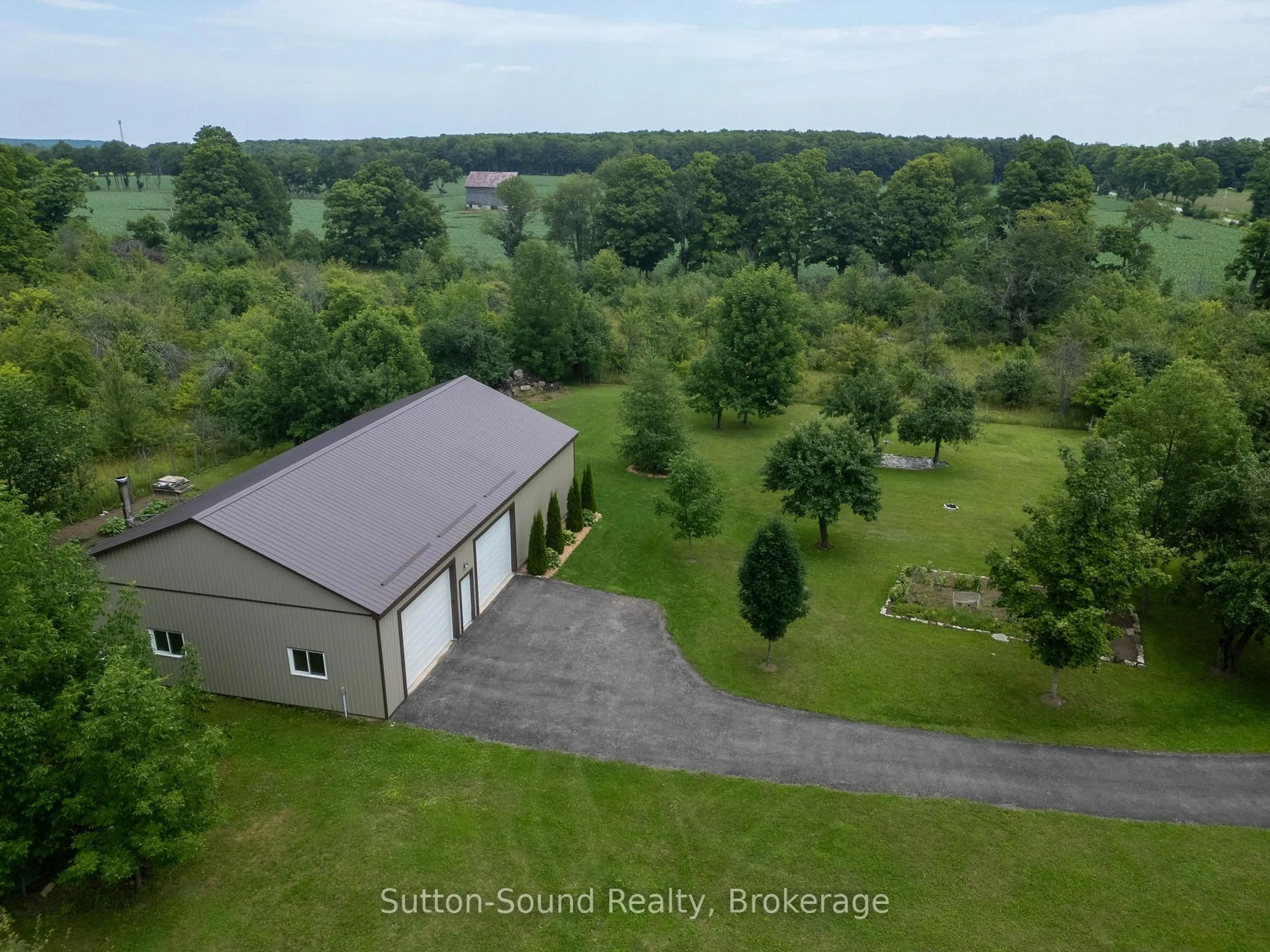 A pic from outside/outdoor area/front of a property/back of a property/a pic from drone, water/lake/river/ocean view for 442513 21 Concession, Georgian Bluffs Ontario N0H 2T0