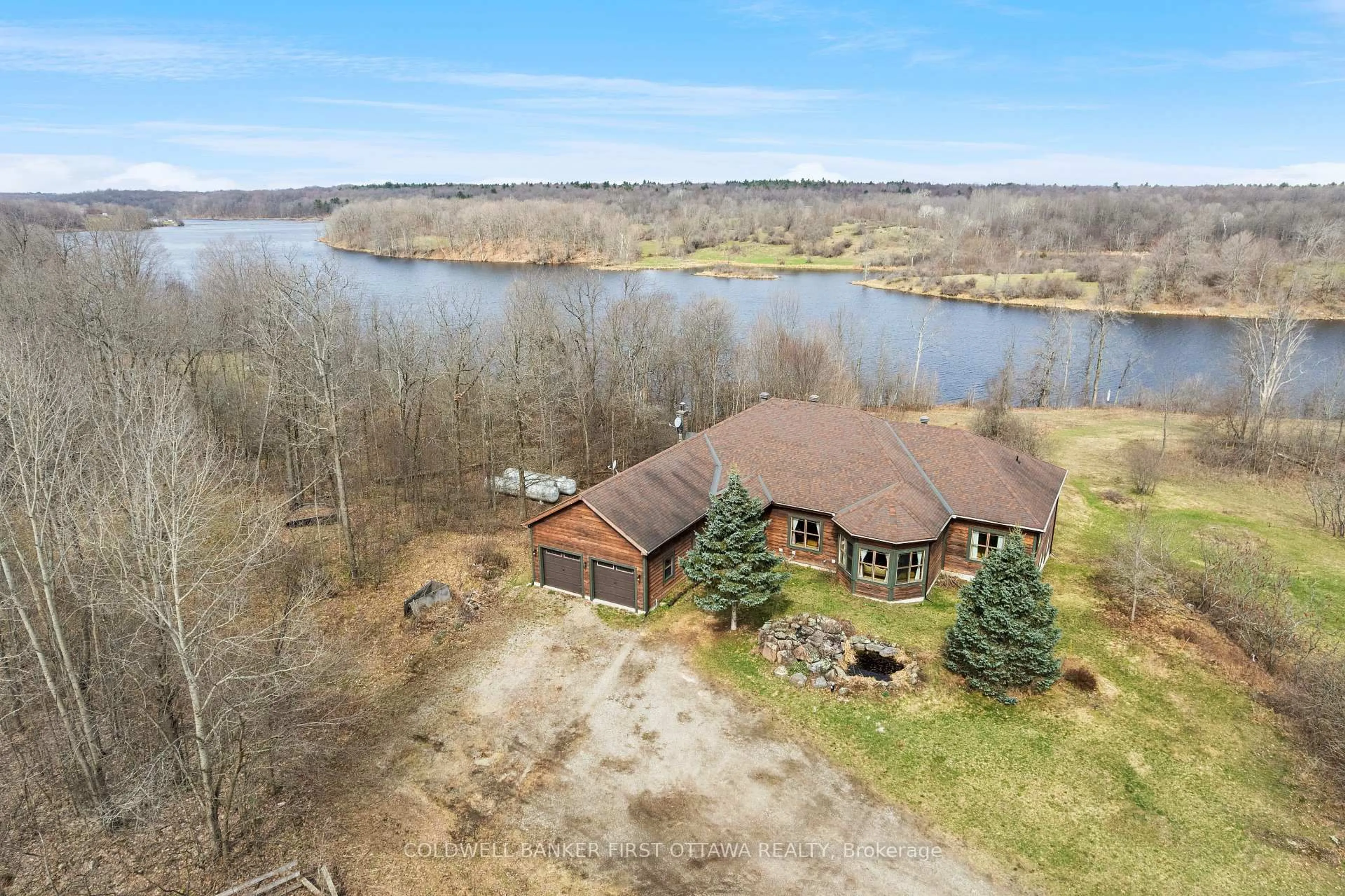 A pic from outside/outdoor area/front of a property/back of a property/a pic from drone, water/lake/river/ocean view for 399 Grady Rd, Rideau Lakes Ontario K0G 1X0