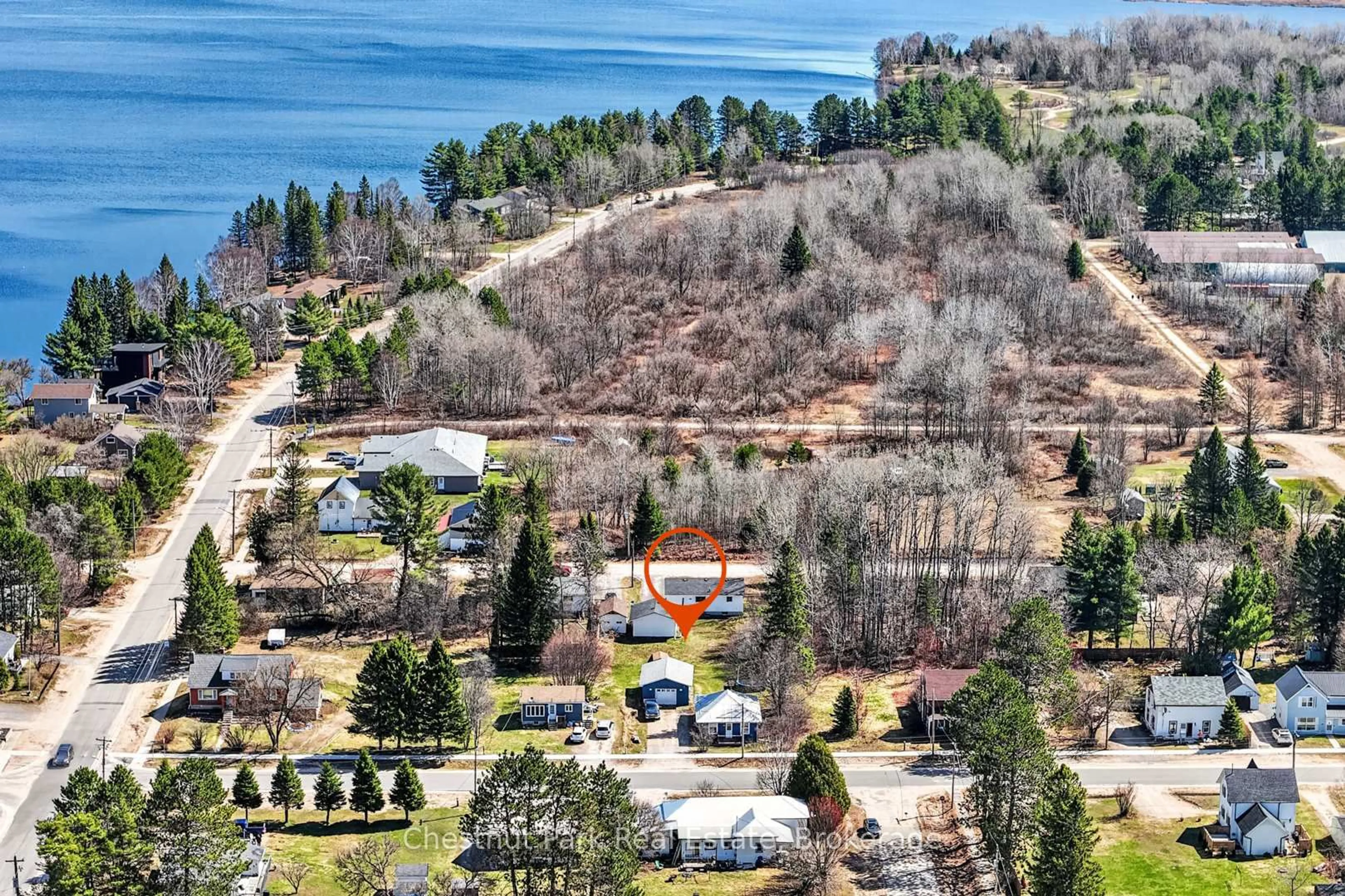 A pic from outside/outdoor area/front of a property/back of a property/a pic from drone, water/lake/river/ocean view for 35 Broadway St, South River Ontario P0A 1X0