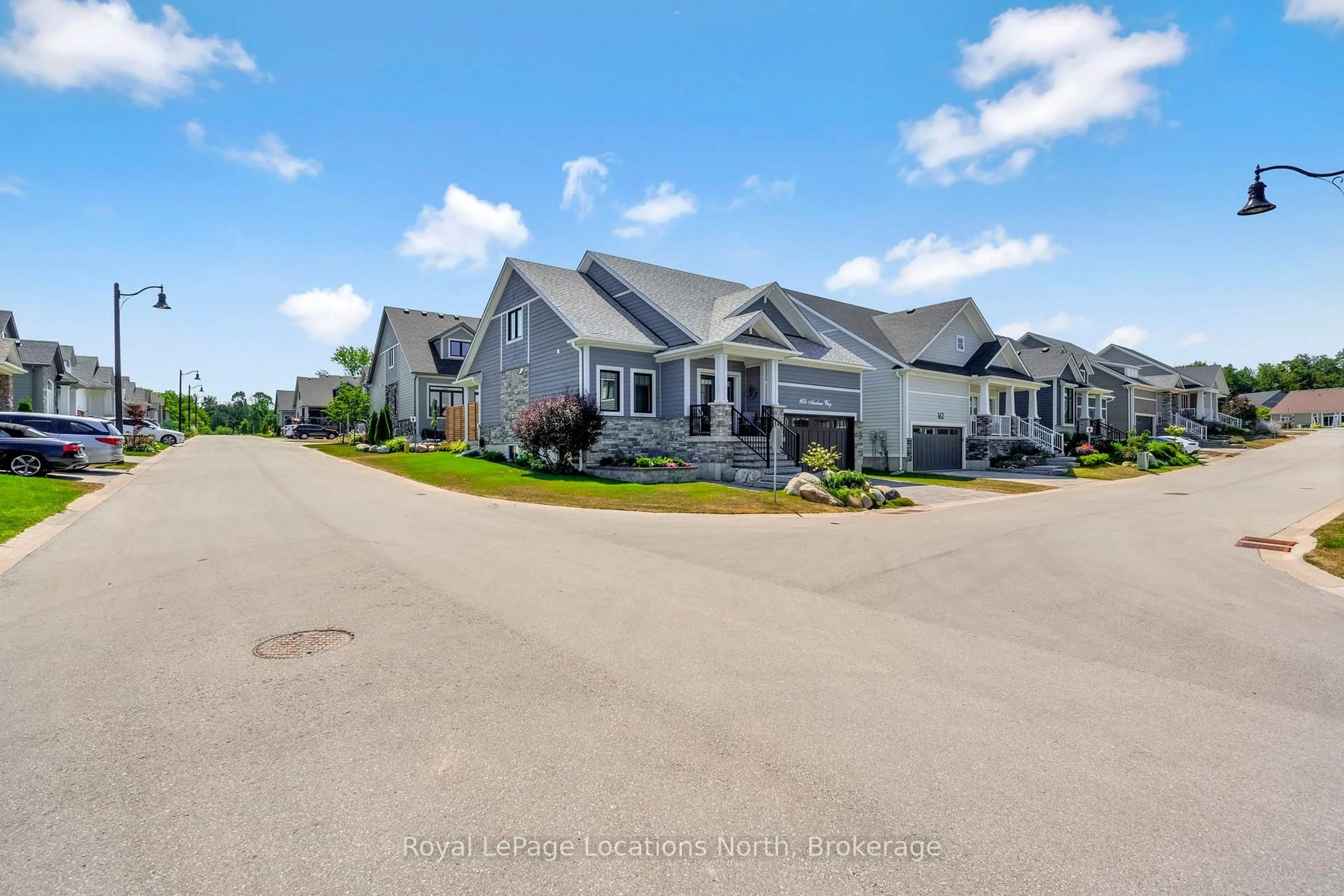 A pic from outside/outdoor area/front of a property/back of a property/a pic from drone, street for 164 Anchors Way, Blue Mountains Ontario N0H 2P0