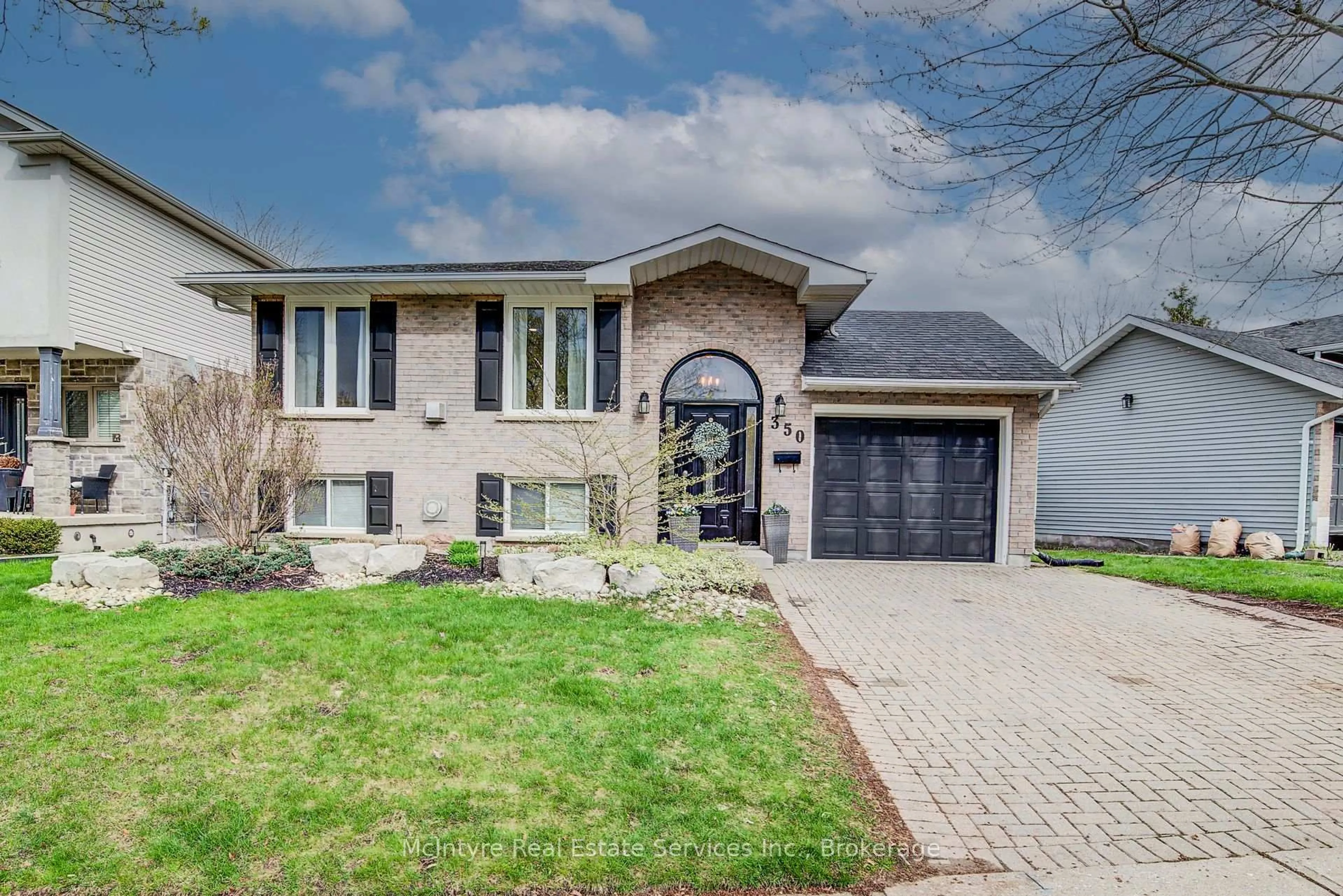 Home with brick exterior material, street for 350 Auburn Dr, Waterloo Ontario N2K 3K9