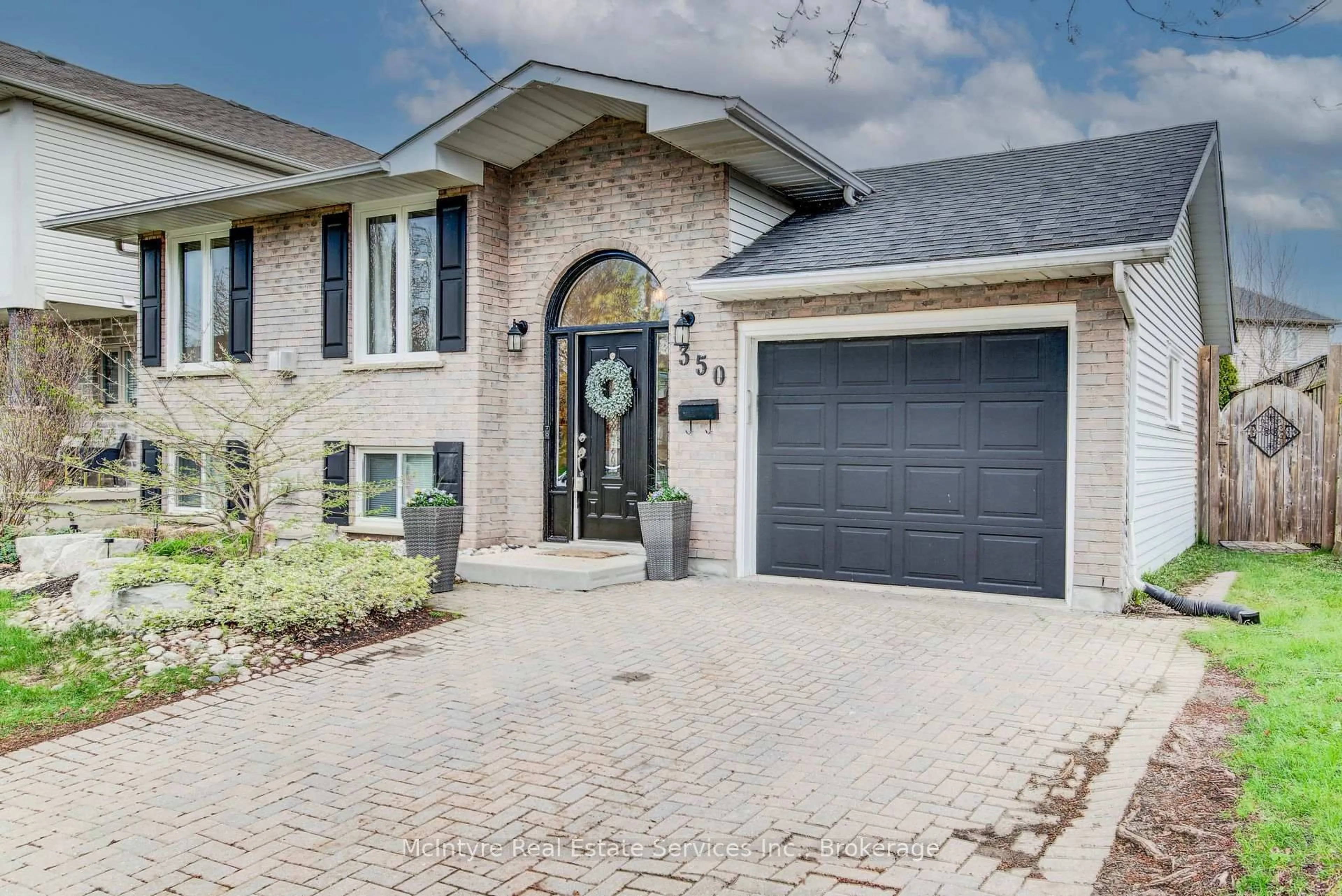 Home with brick exterior material, street for 350 Auburn Dr, Waterloo Ontario N2K 3K9
