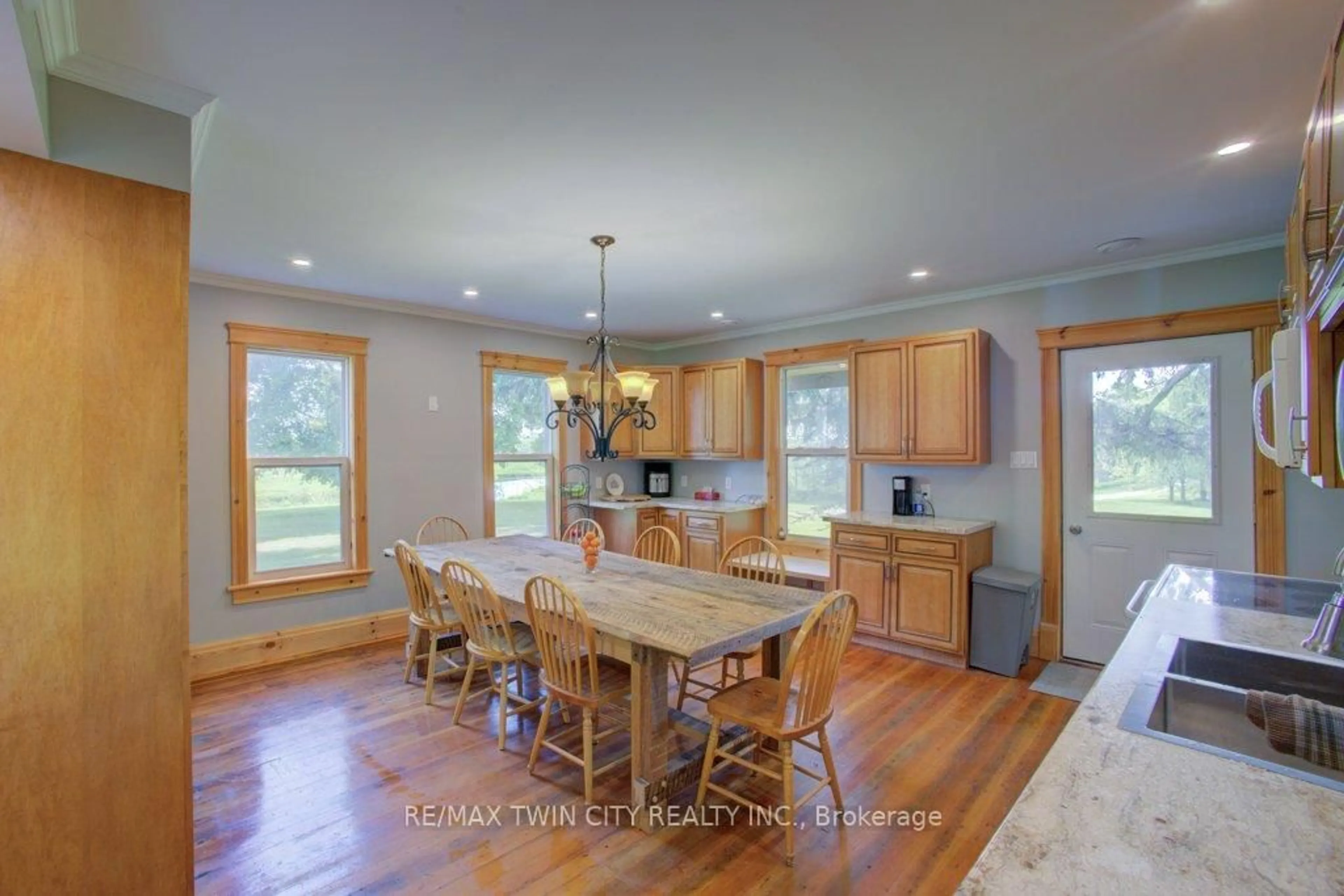Open concept kitchen, wood/laminate floor for 86561 London Rd, North Huron Ontario N0G 2W0