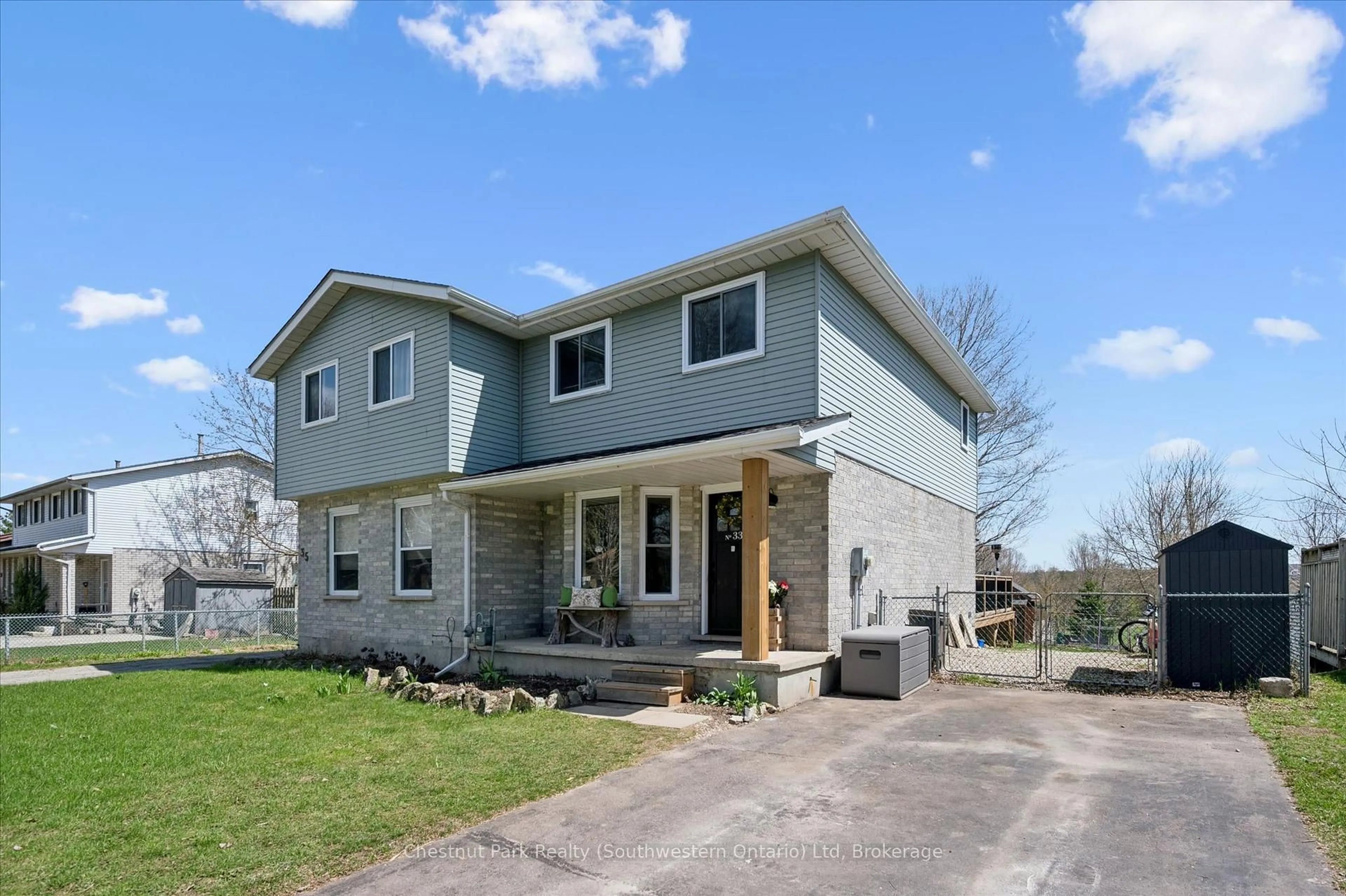 Home with vinyl exterior material, street for 33 Wilson Cres, Centre Wellington Ontario N0B 1S0