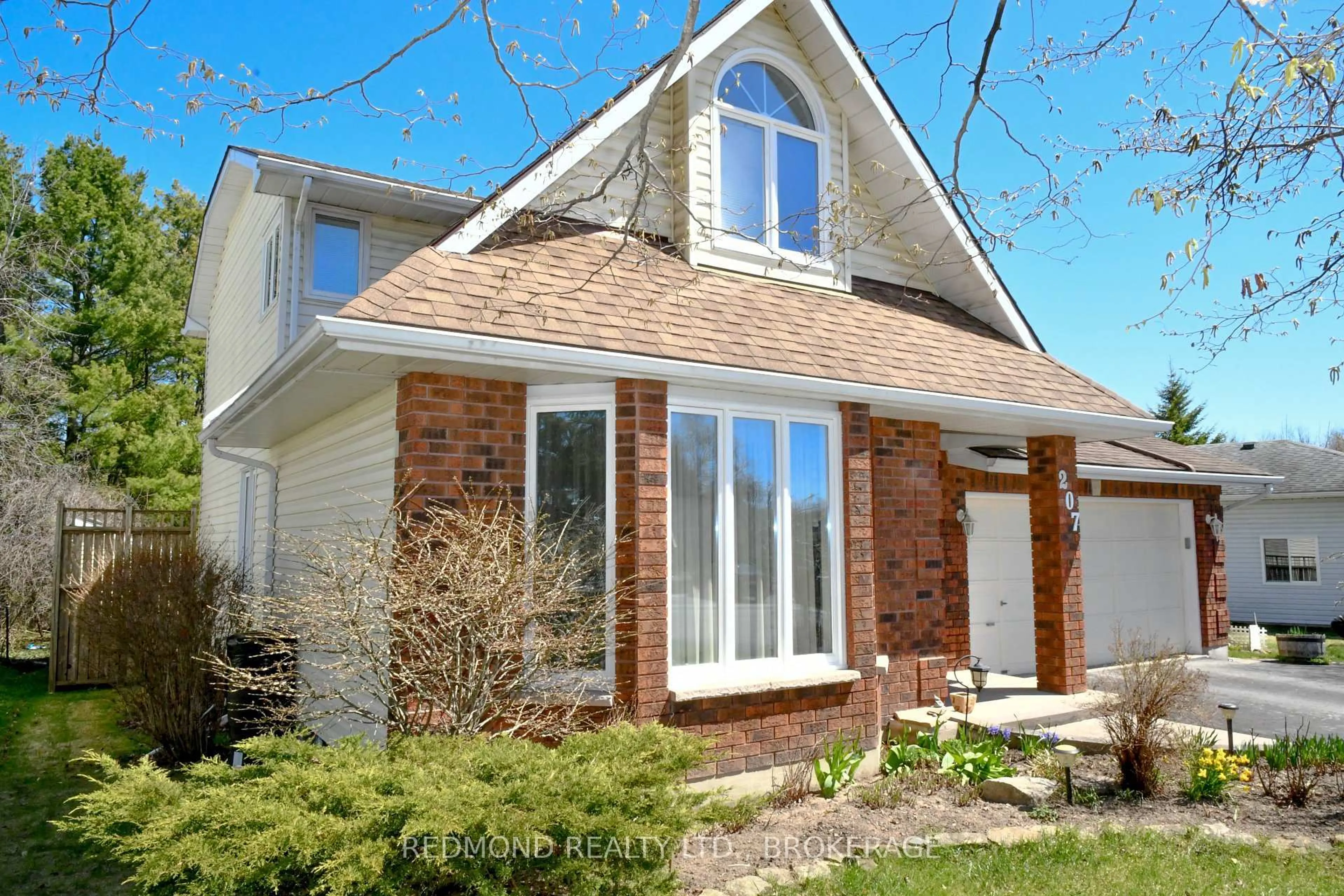 Home with brick exterior material, street for 207 JEAN Dr, Gananoque Ontario K7G 3C4