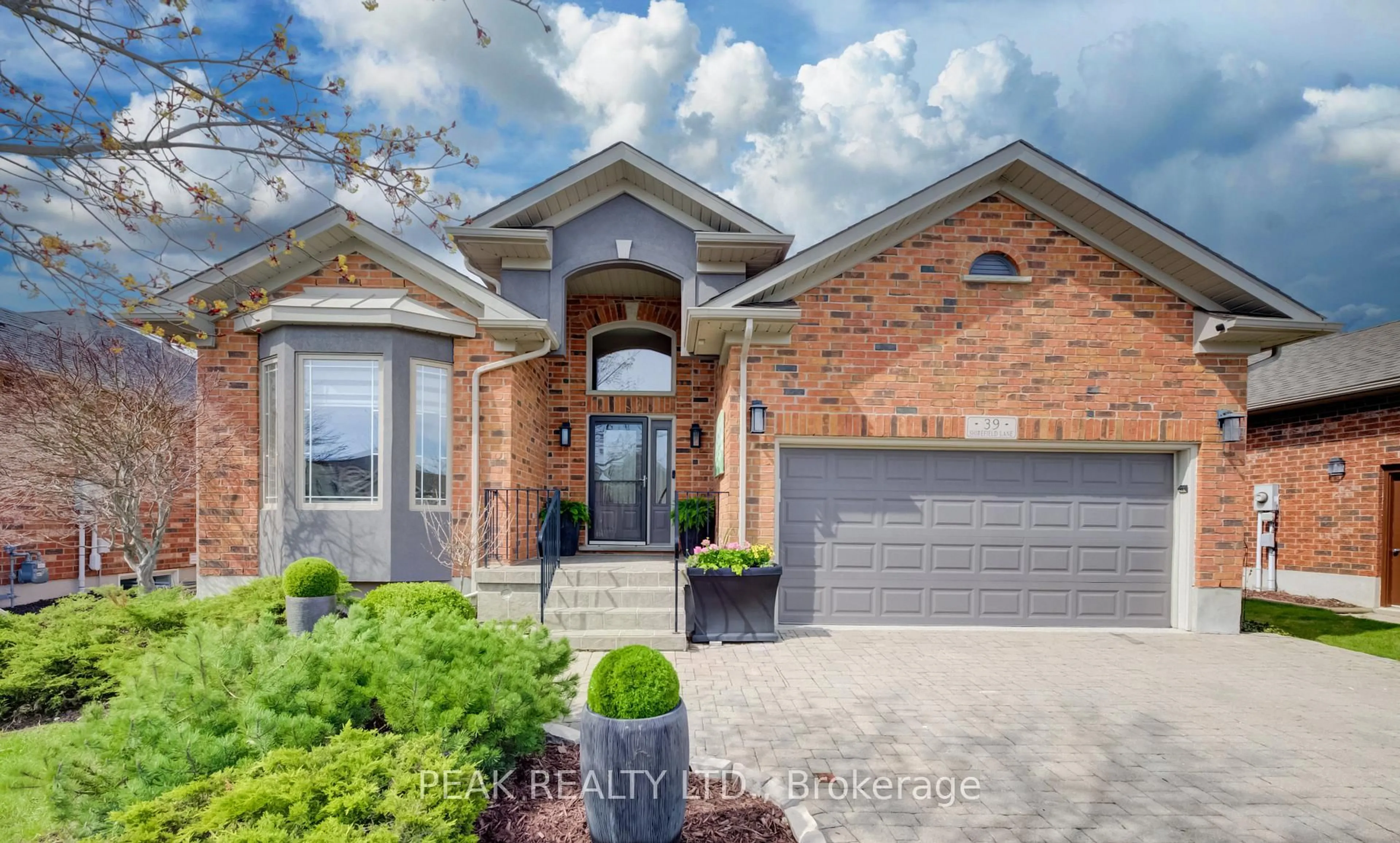Home with brick exterior material, street for 39 Shirefield Lane, Wilmot Ontario N3A 4L8