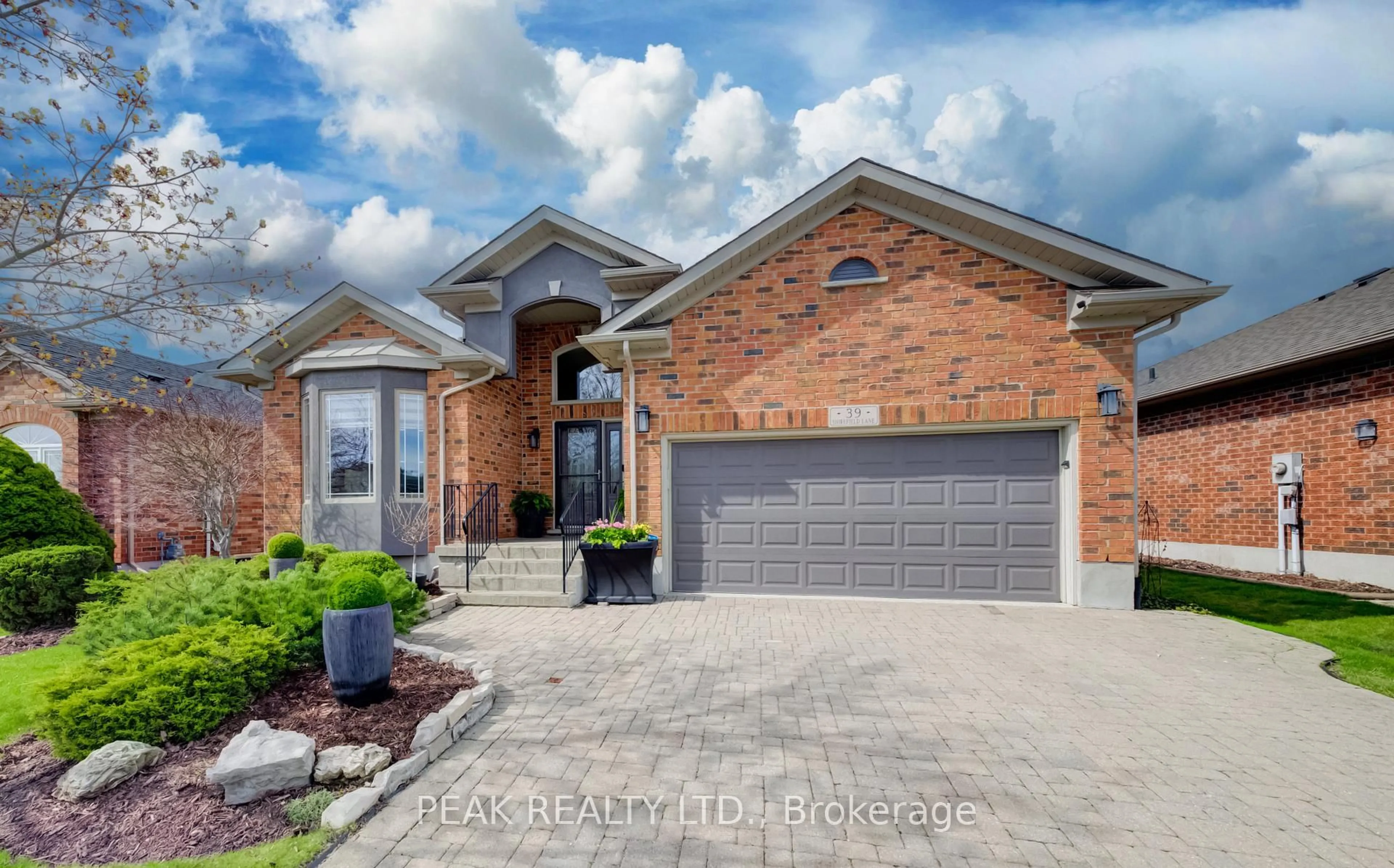 Home with brick exterior material, street for 39 Shirefield Lane, Wilmot Ontario N3A 4L8