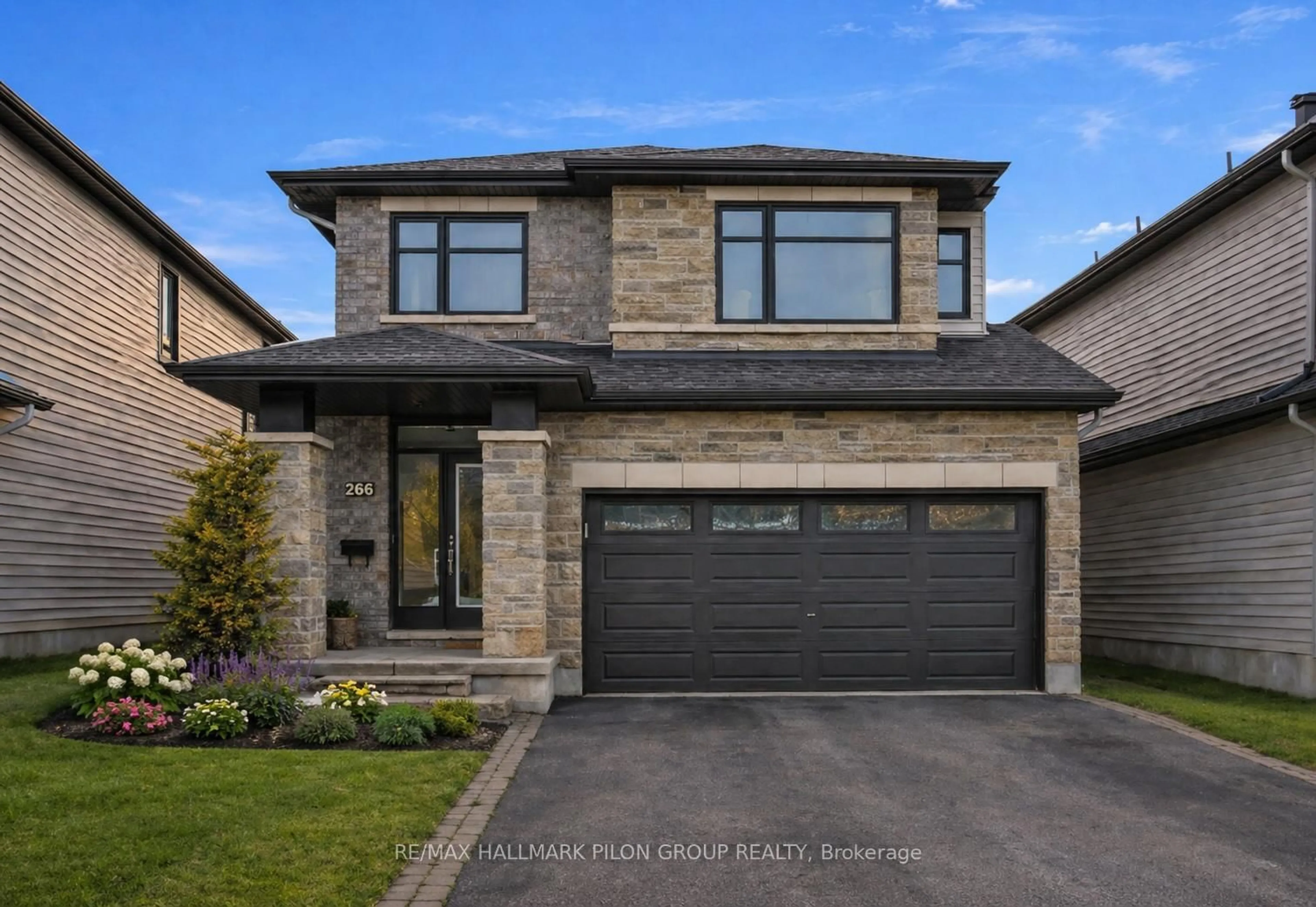 Home with brick exterior material, street for 266 Shinleaf Cres, Ottawa Ontario K1W 0J2