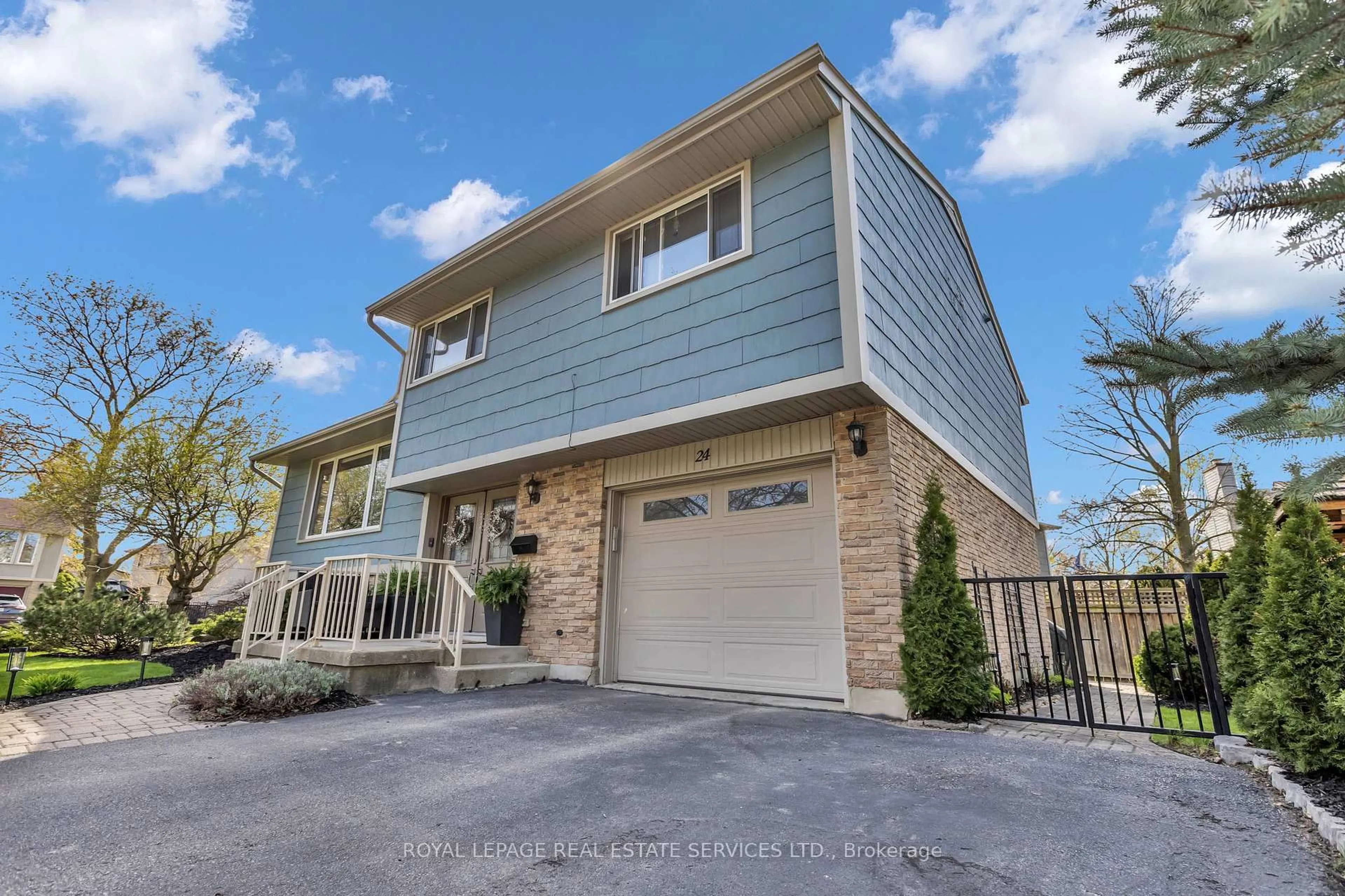 Home with vinyl exterior material, street for 24 Shuh Ave, Kitchener Ontario N2A 2X9