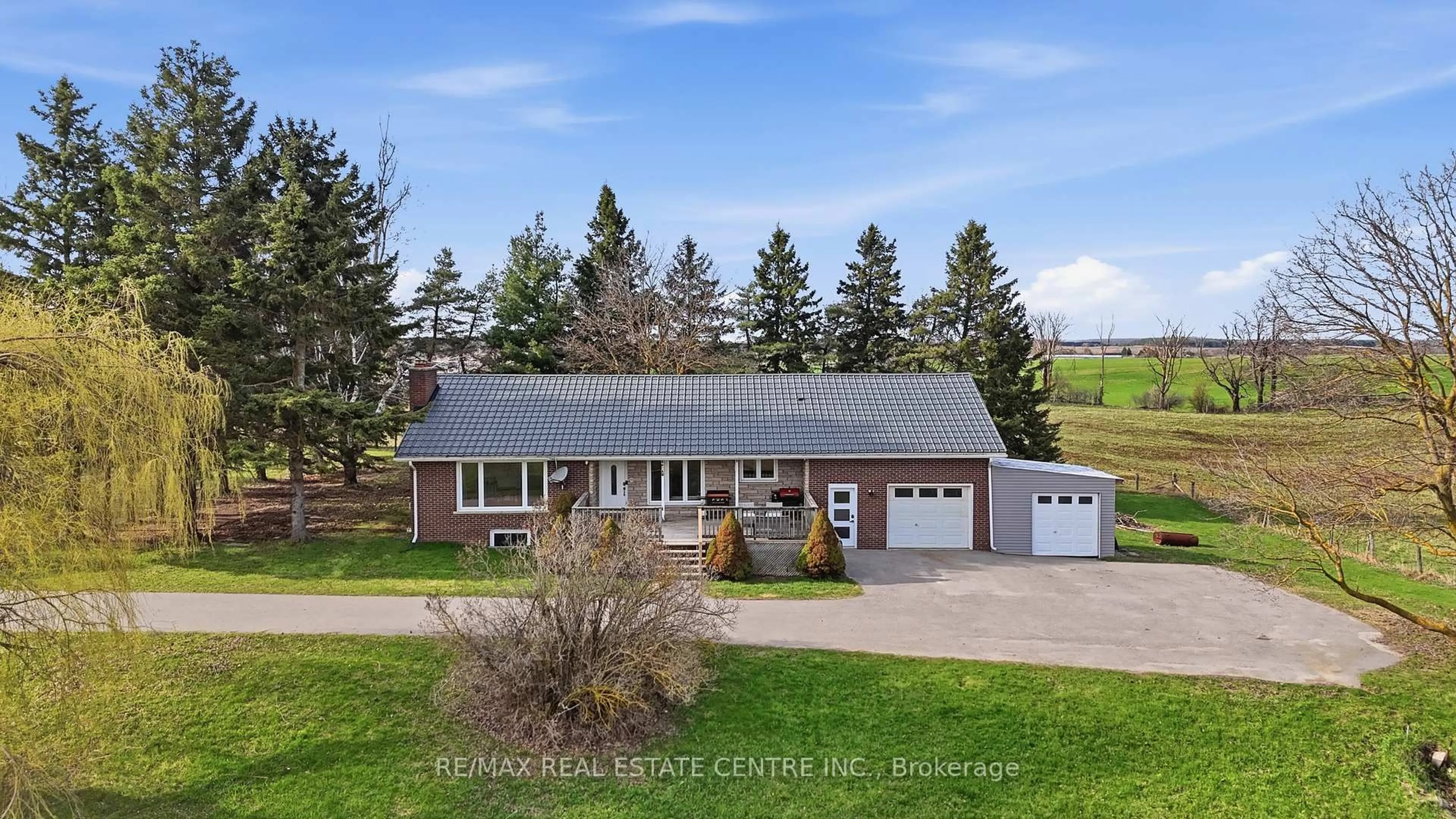 A pic from outside/outdoor area/front of a property/back of a property/a pic from drone, unknown for 517021 County Rd 124 Rd, Melancthon Ontario L9V 1V4