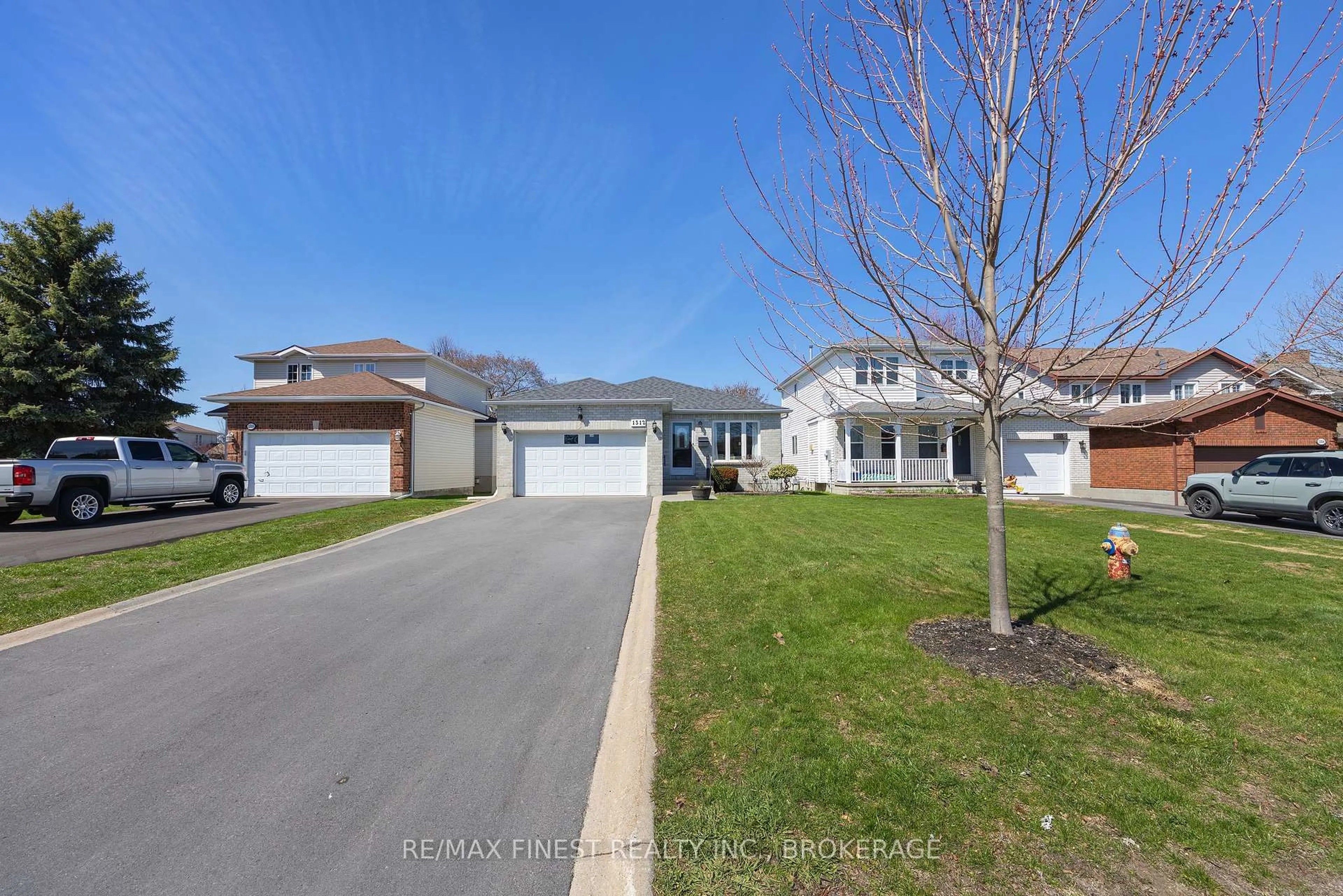 A pic from outside/outdoor area/front of a property/back of a property/a pic from drone, street for 1312 Fisher Cres, Kingston Ontario K7M 8T2