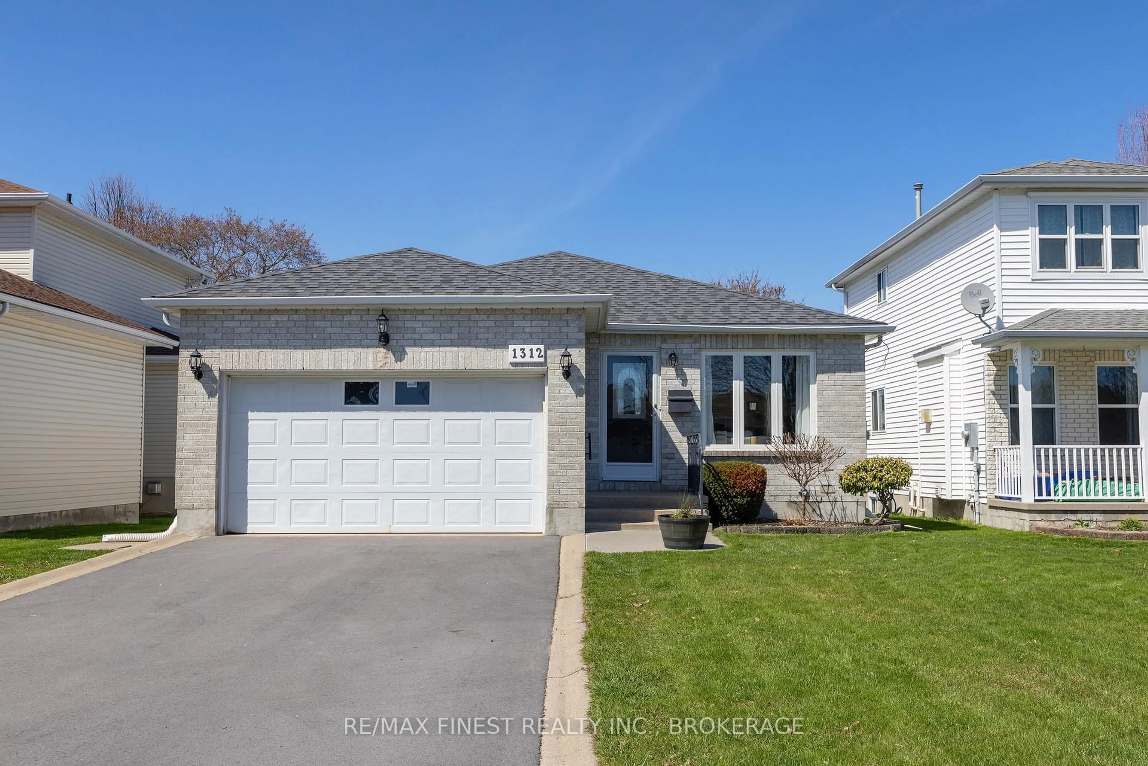 Home with vinyl exterior material, street for 1312 Fisher Cres, Kingston Ontario K7M 8T2