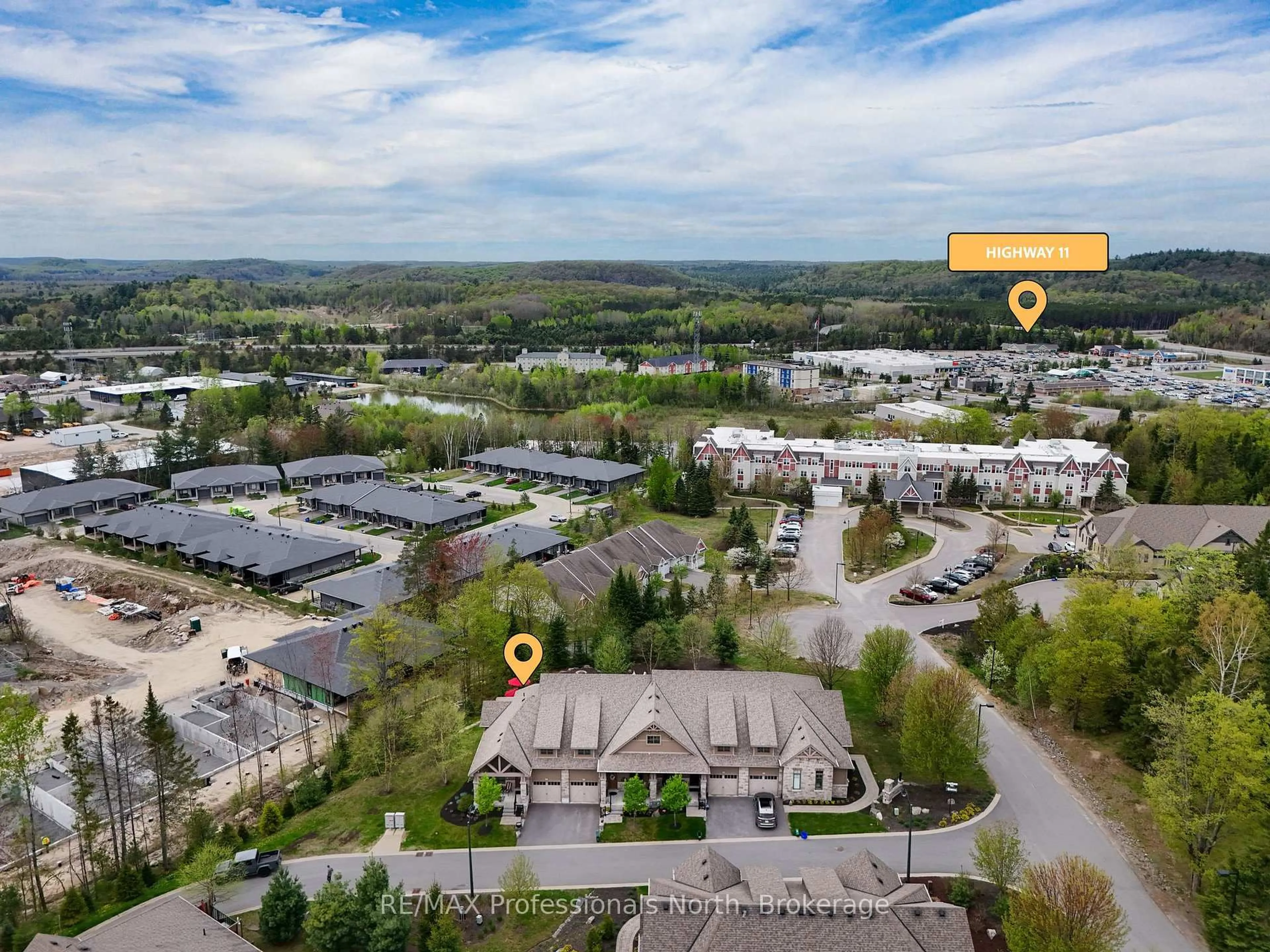 A pic from outside/outdoor area/front of a property/back of a property/a pic from drone, mountain view for 8 Serenity Place Cres, Huntsville Ontario P1H 0C4