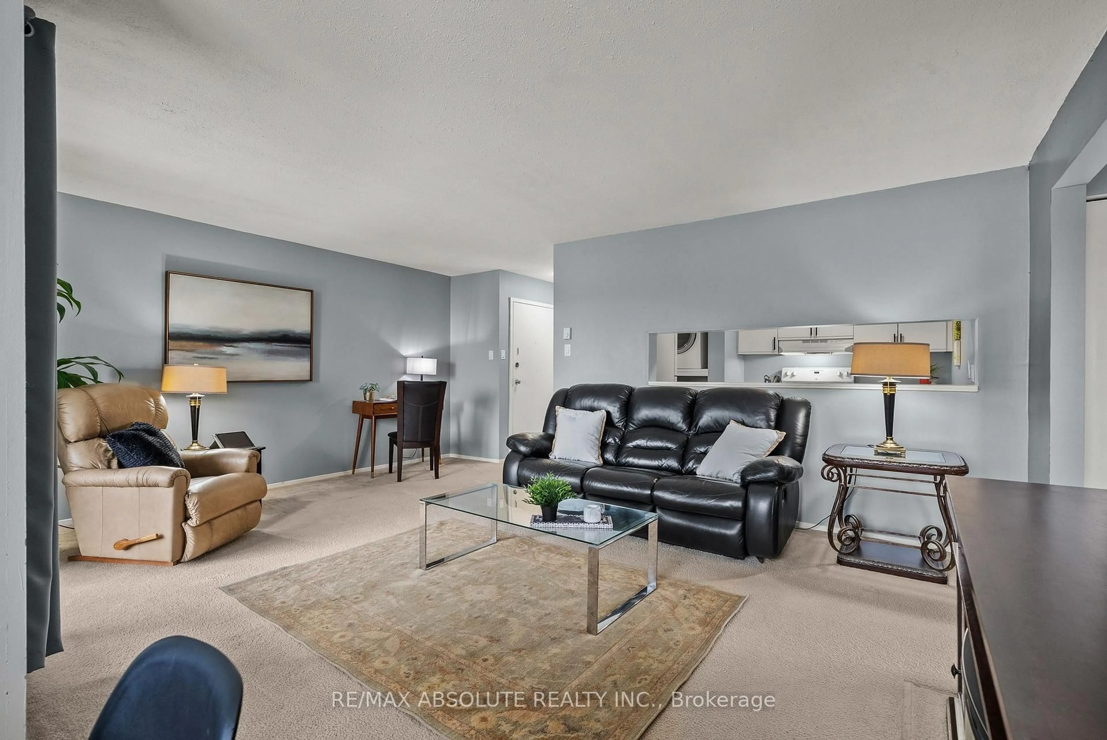 Living room with furniture, unknown for 216 Viewmount Dr #415, Ottawa Ontario K2E 7X4