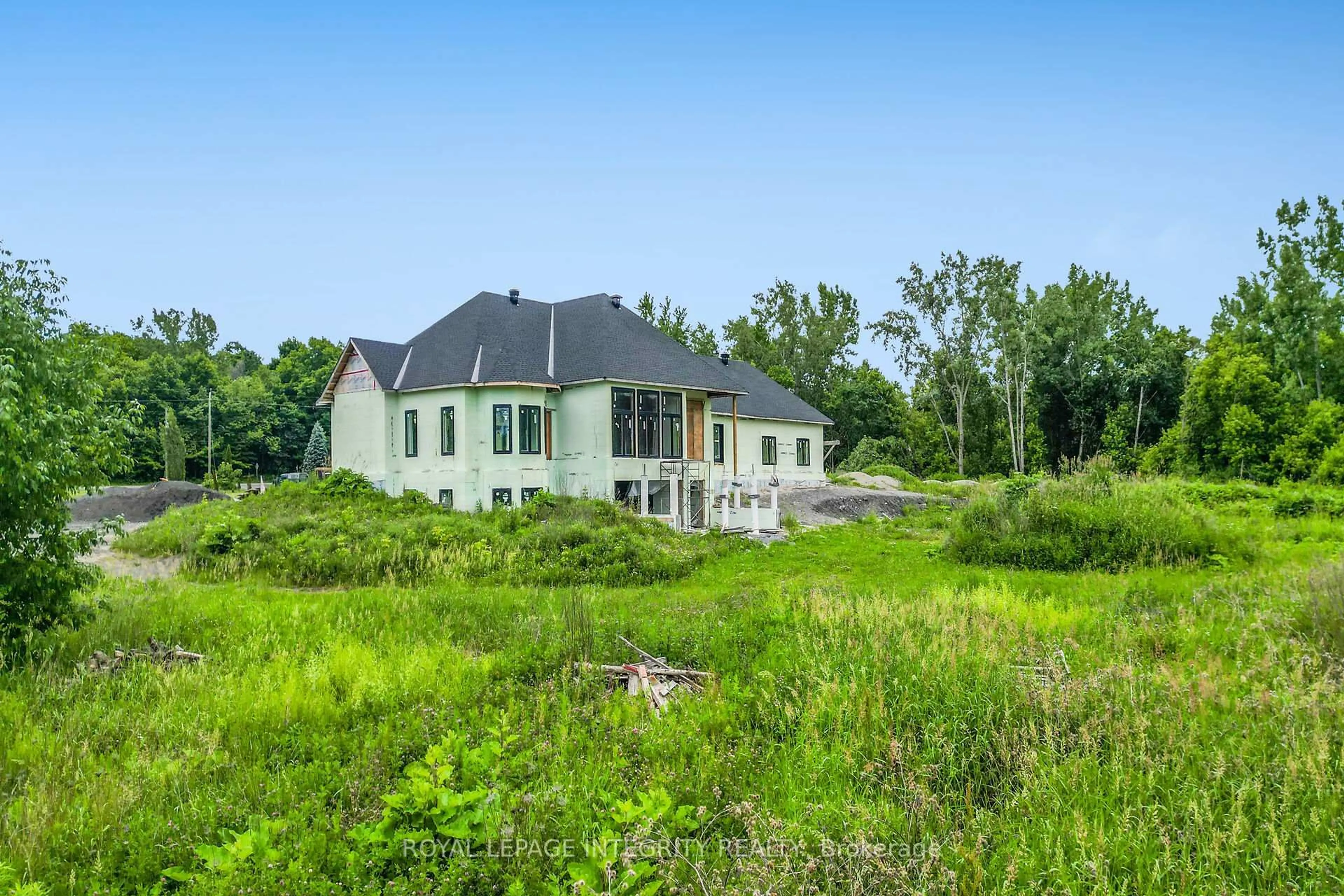 A pic from outside/outdoor area/front of a property/back of a property/a pic from drone, unknown for 1695 Old Montreal Rd, Ottawa Ontario K4C 1G7