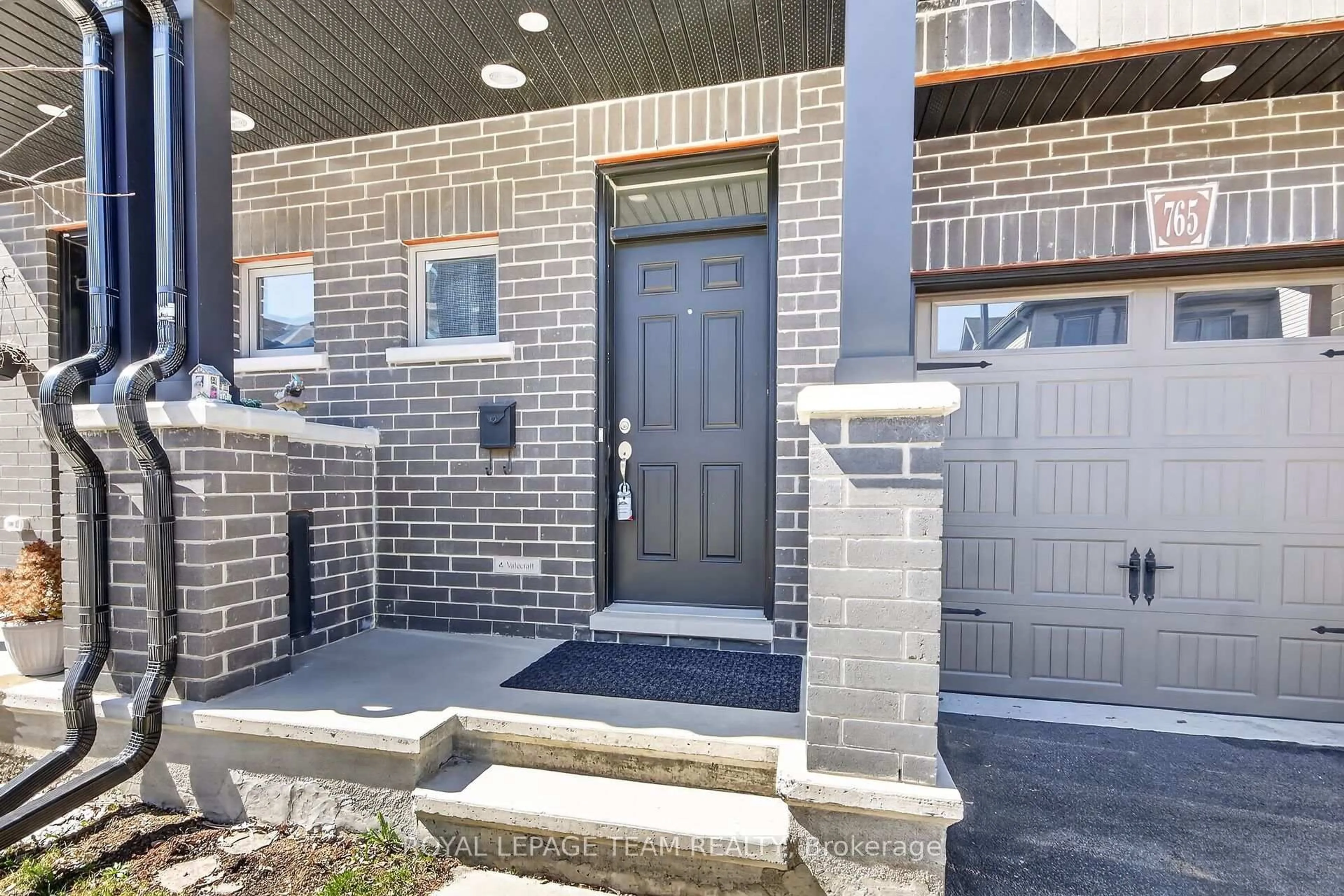 Home with brick exterior material, street for 765 Dearborn Private, Ottawa Ontario K1T 0W3