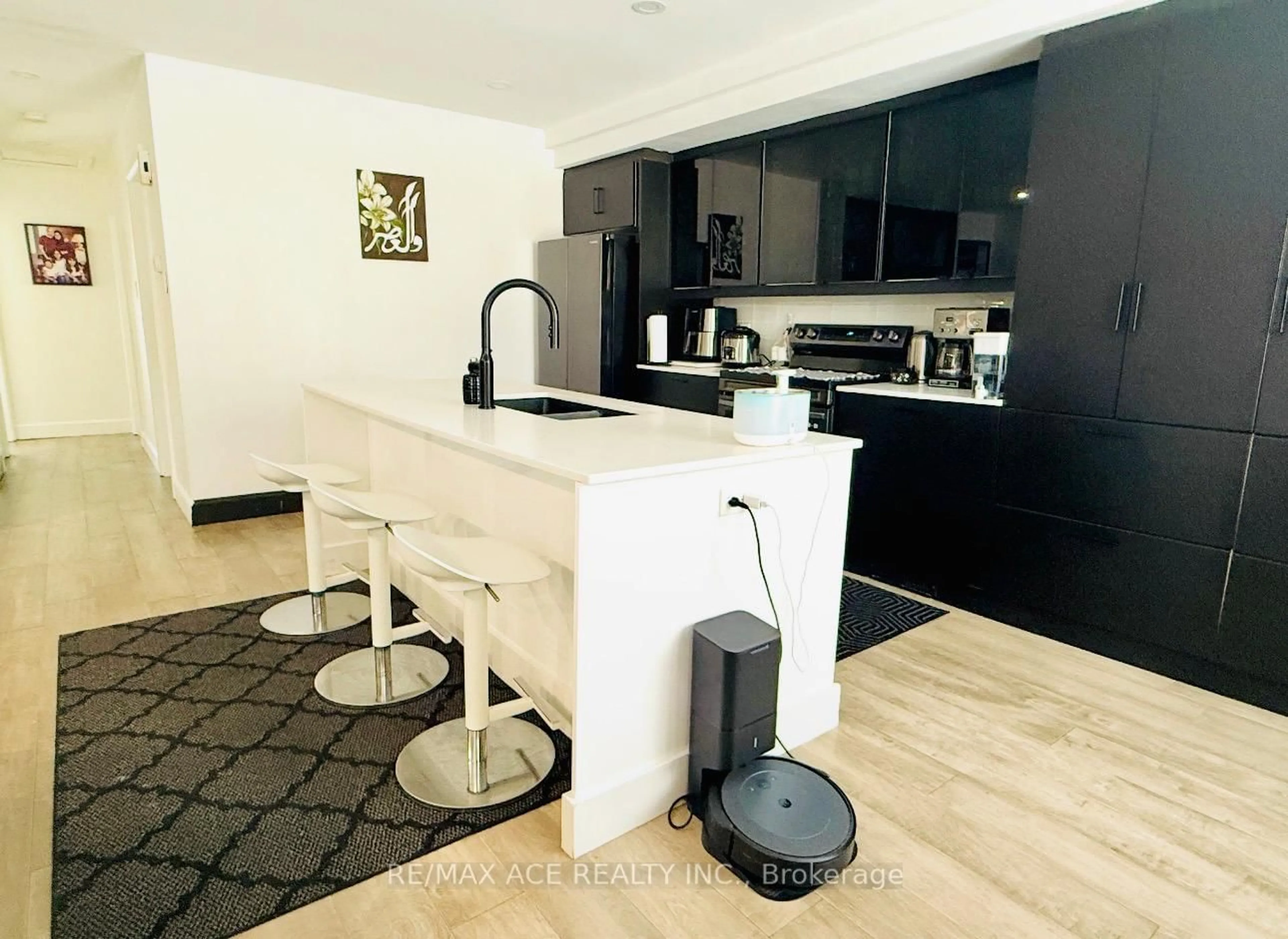 Open concept kitchen, wood/laminate floor for 59 Patience Cres, London South Ontario N6E 2K7