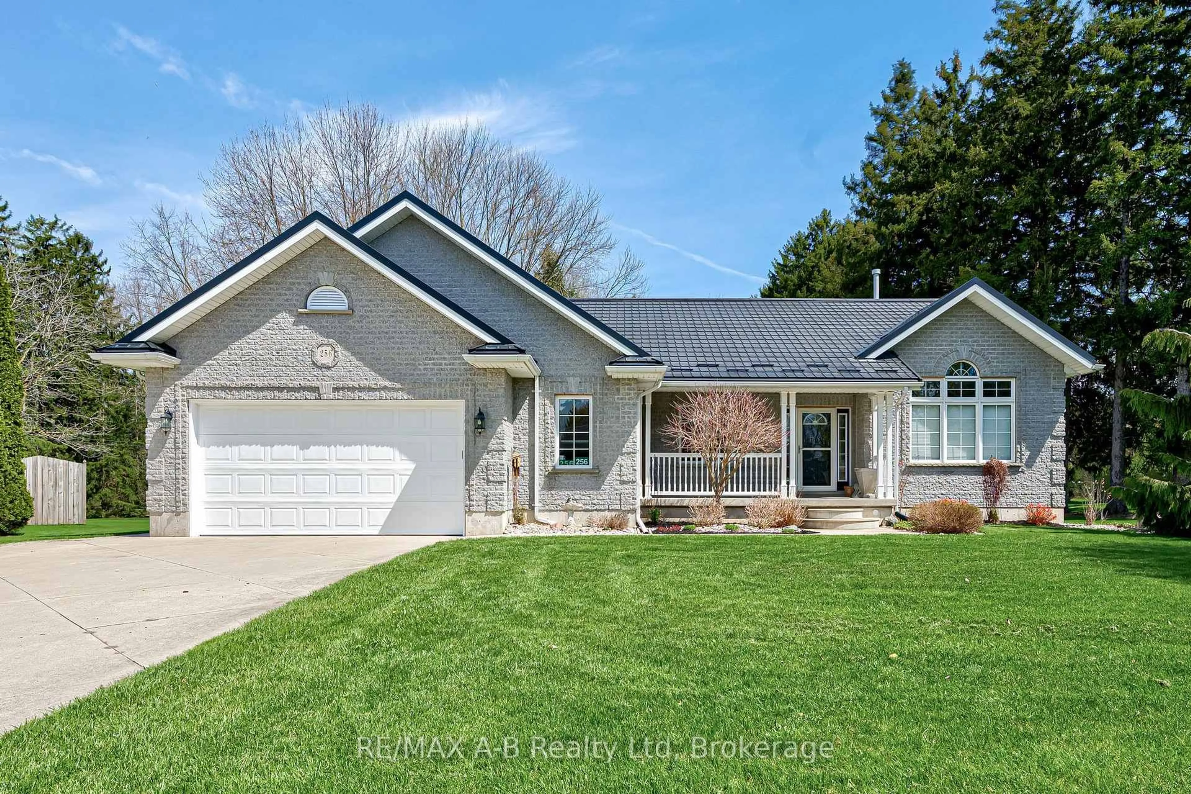 Home with vinyl exterior material, street for 256 Boyce St, Perth South Ontario N0K 1X0