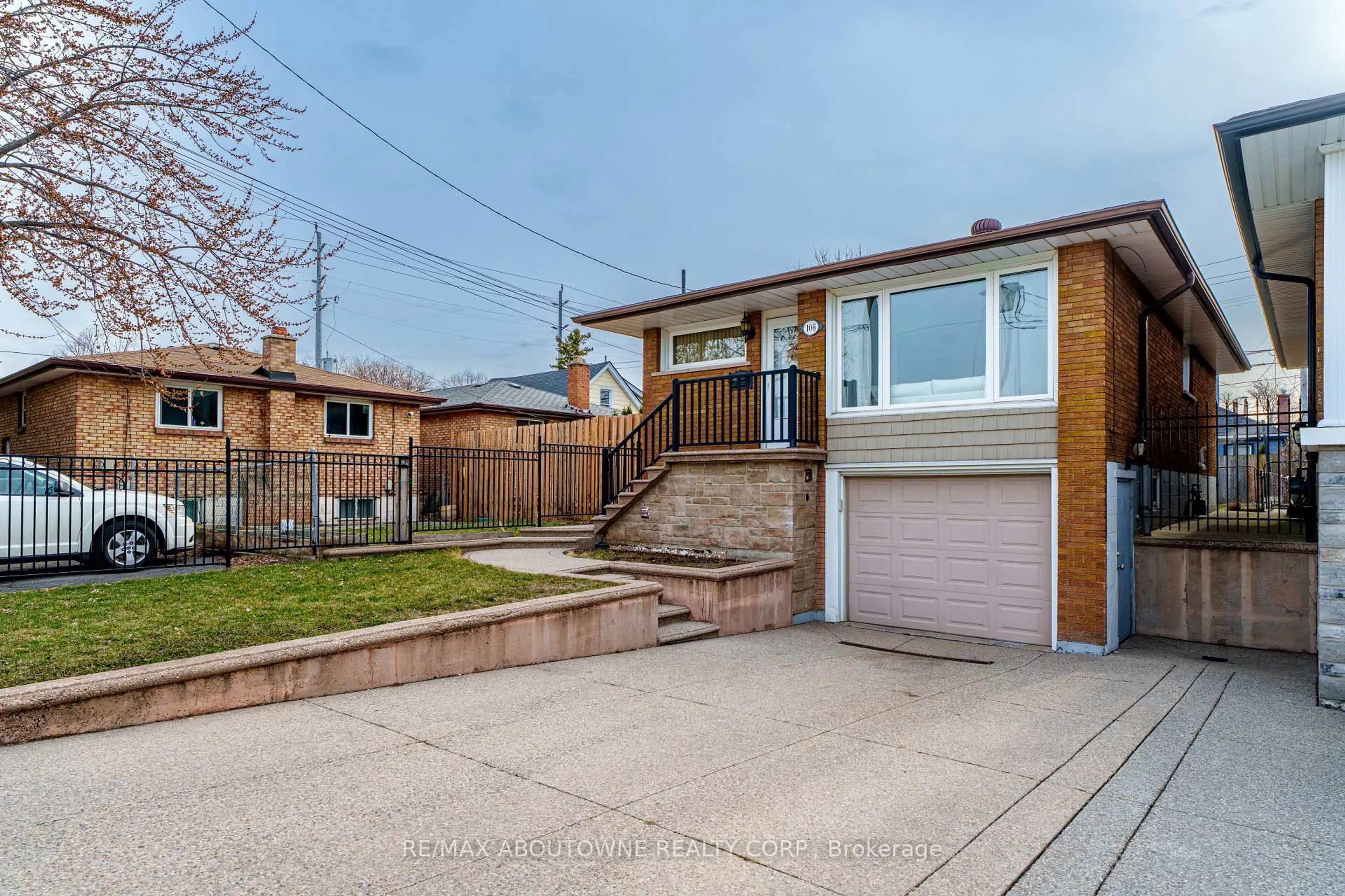 Home with brick exterior material, street for 106 Beland Ave, Hamilton Ontario L8H 6C1