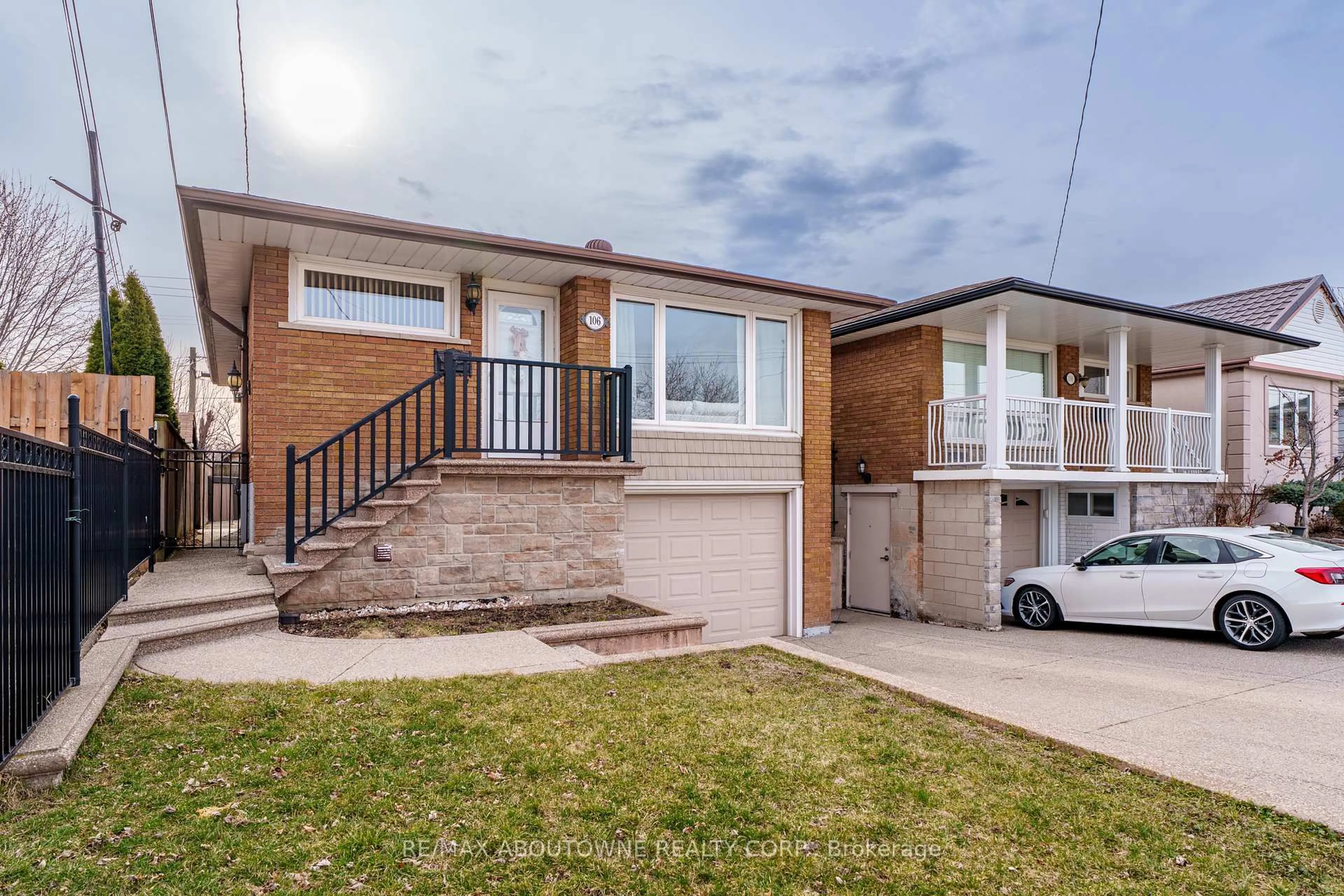 Home with brick exterior material, street for 106 Beland Ave, Hamilton Ontario L8H 6C1