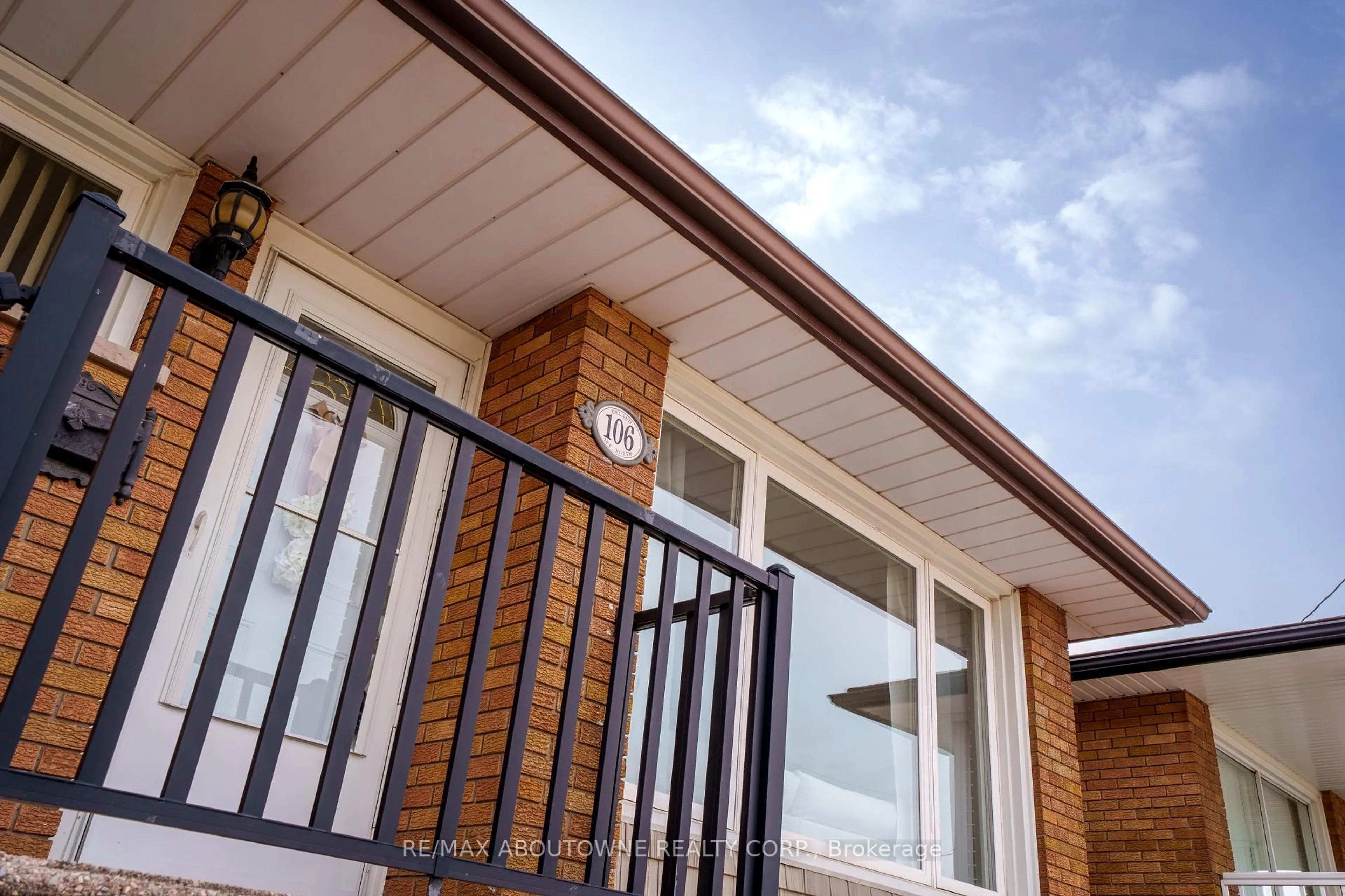 Home with brick exterior material, street for 106 Beland Ave, Hamilton Ontario L8H 6C1