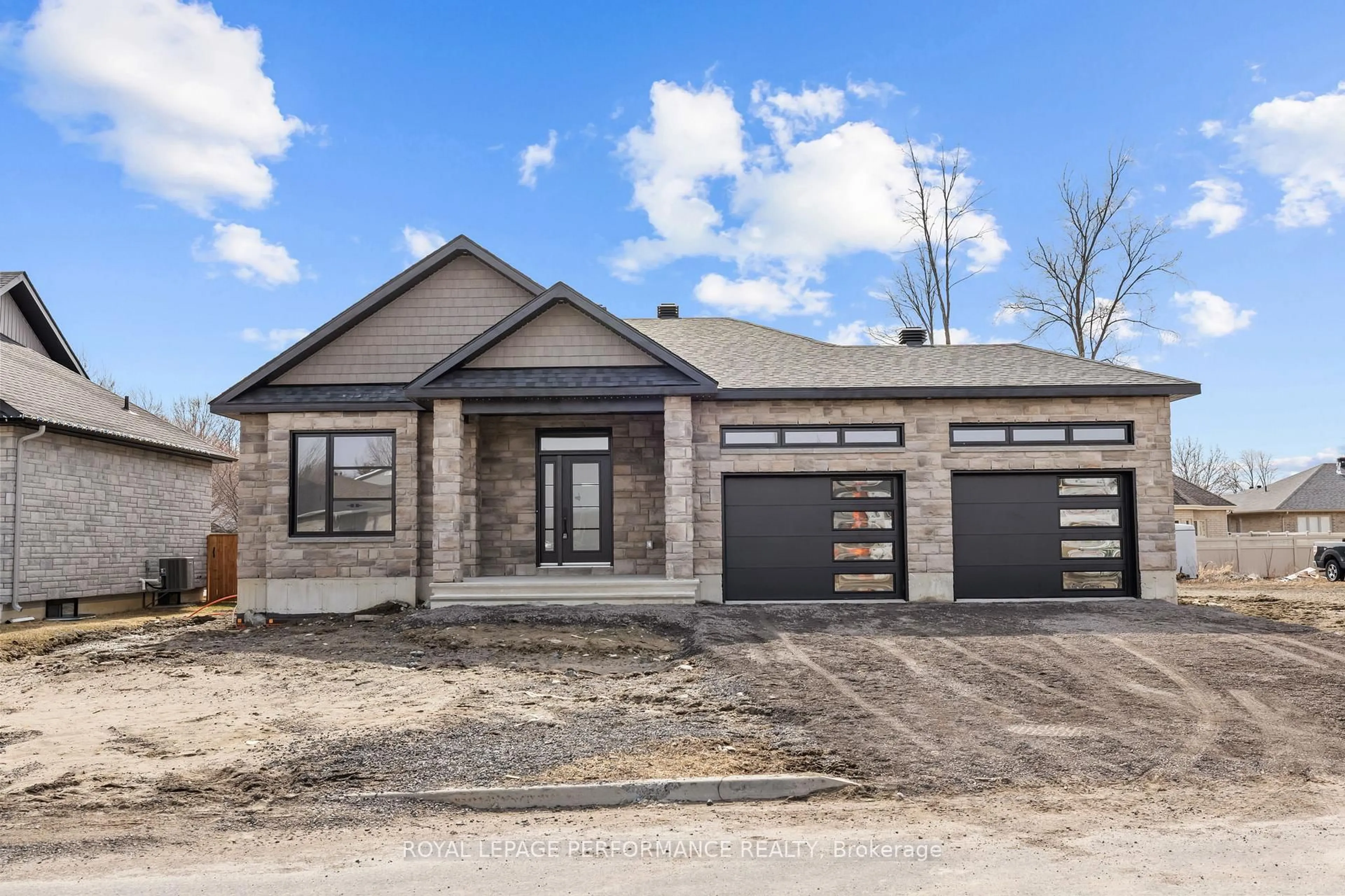 Home with brick exterior material, street for 86 Mille Roches Rd, South Stormont Ontario K0C 1P0