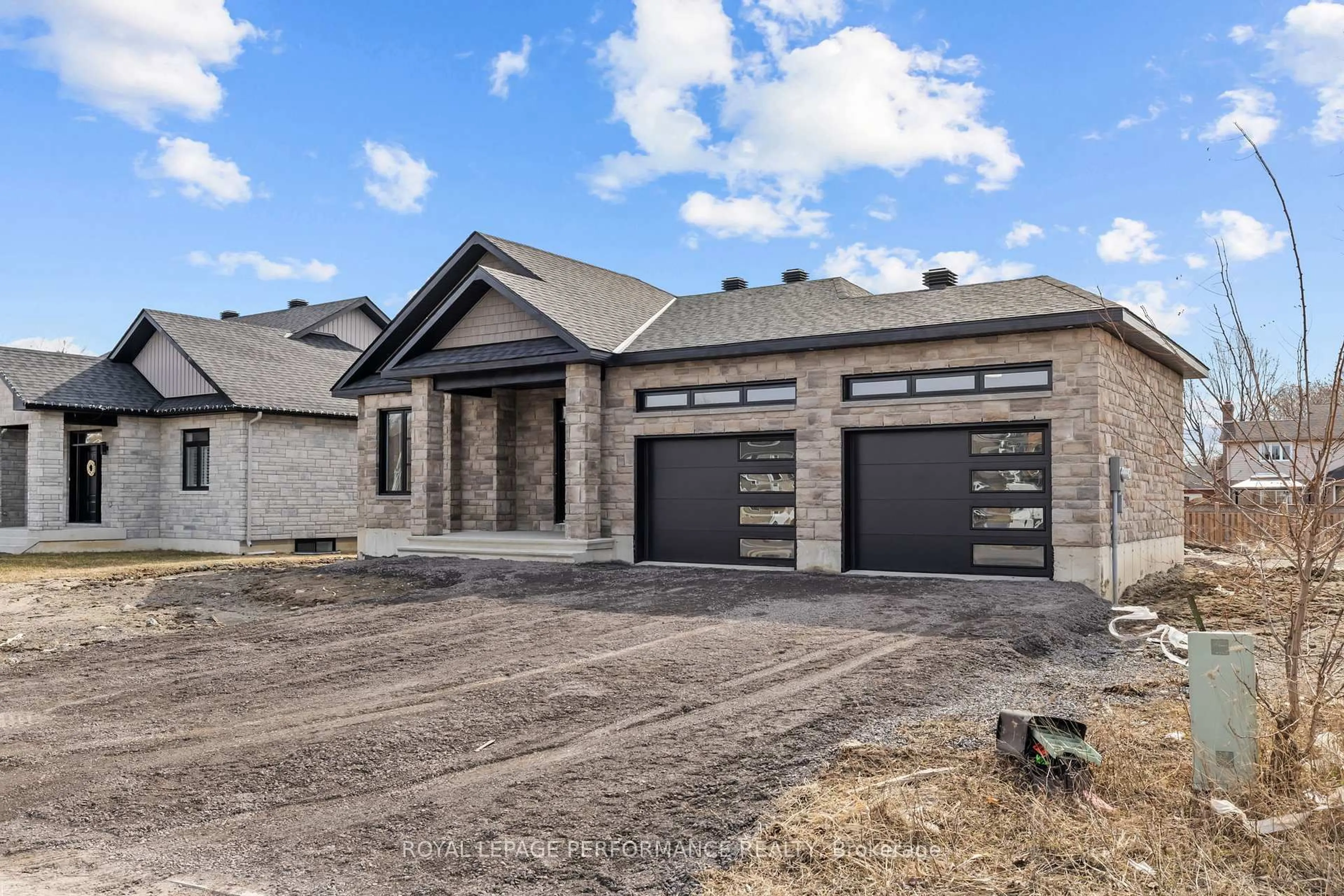 Home with brick exterior material, street for 86 Mille Roches Rd, South Stormont Ontario K0C 1P0