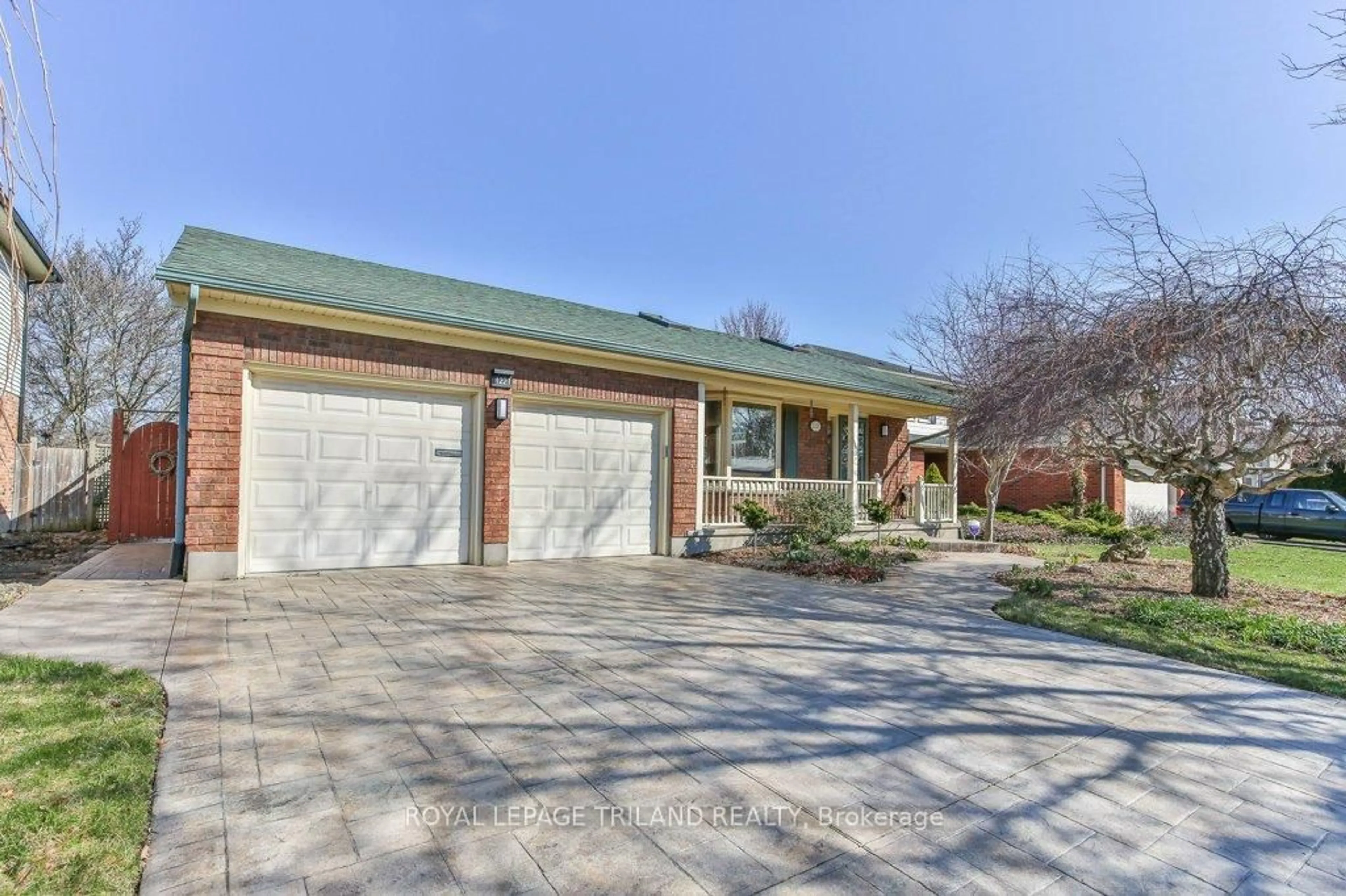 Home with brick exterior material, street for 1221 GLENORA Dr, London North Ontario N5X 2P6