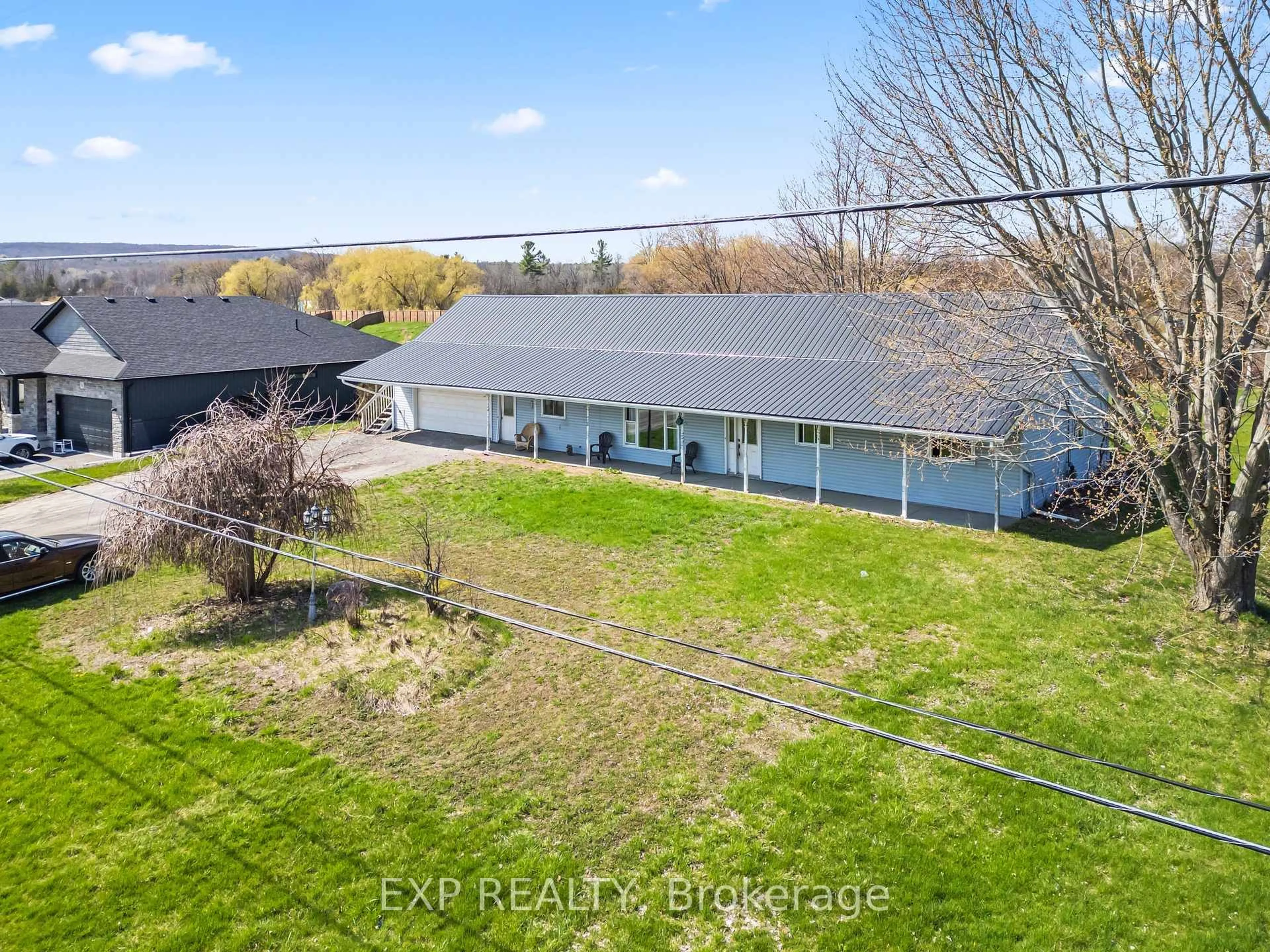 A pic from outside/outdoor area/front of a property/back of a property/a pic from drone, water/lake/river/ocean view for 10 Hillcrest Dr, Quinte West Ontario K8V 0M6