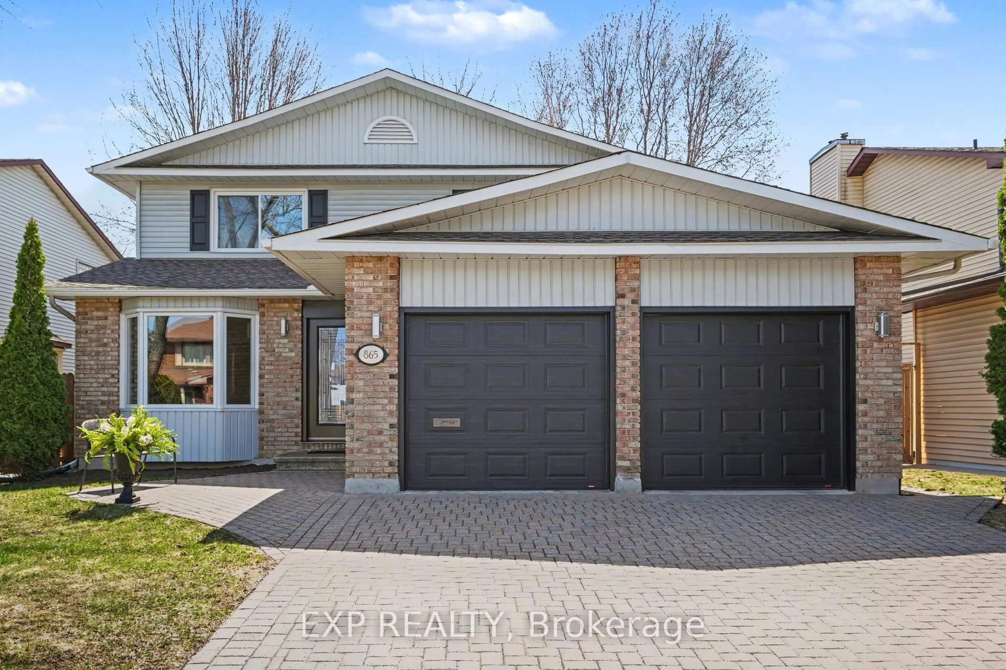 Home with brick exterior material, street for 865 Acadian Gdns, Ottawa Ontario K1C 2V7