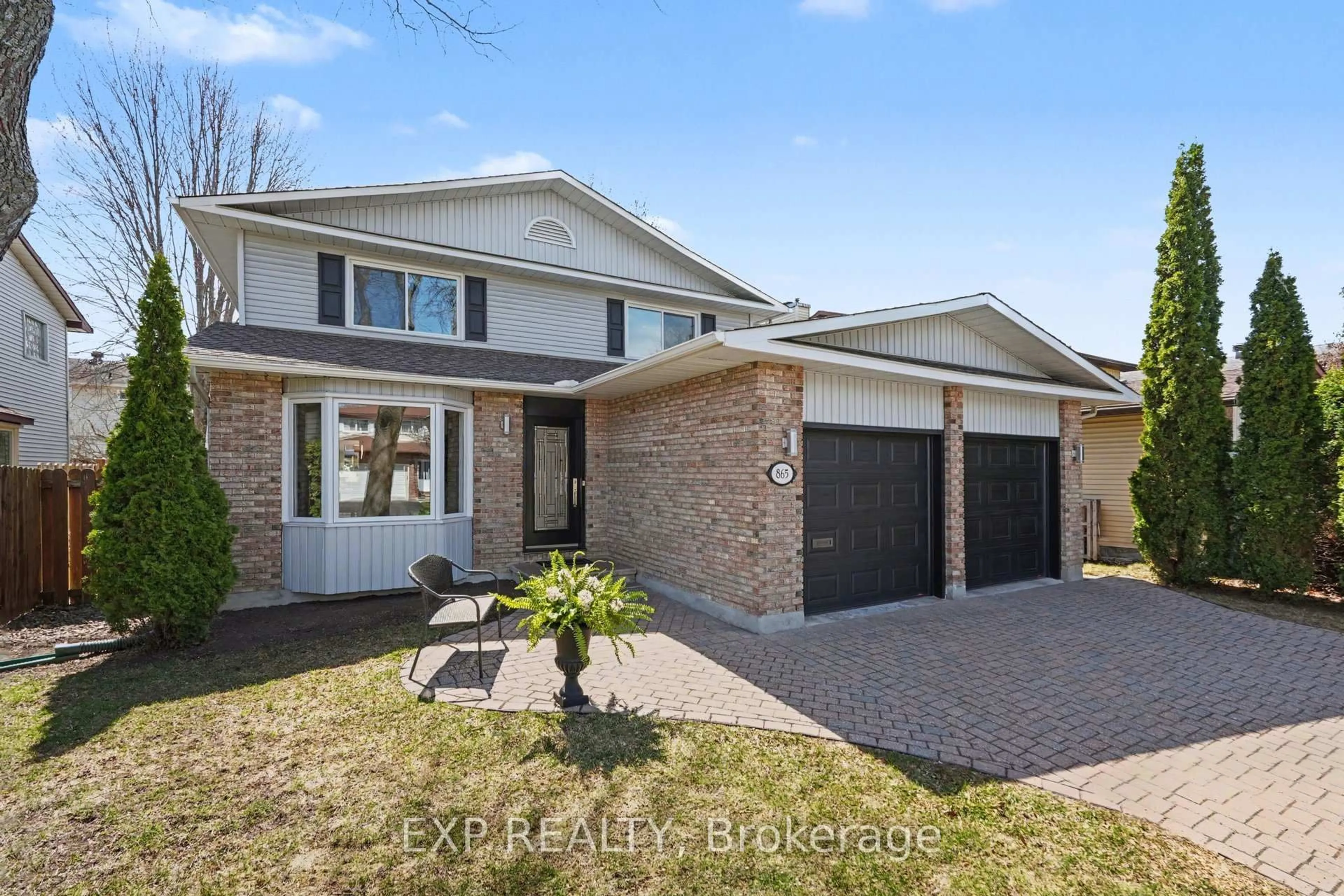Home with brick exterior material, street for 865 Acadian Gdns, Ottawa Ontario K1C 2V7