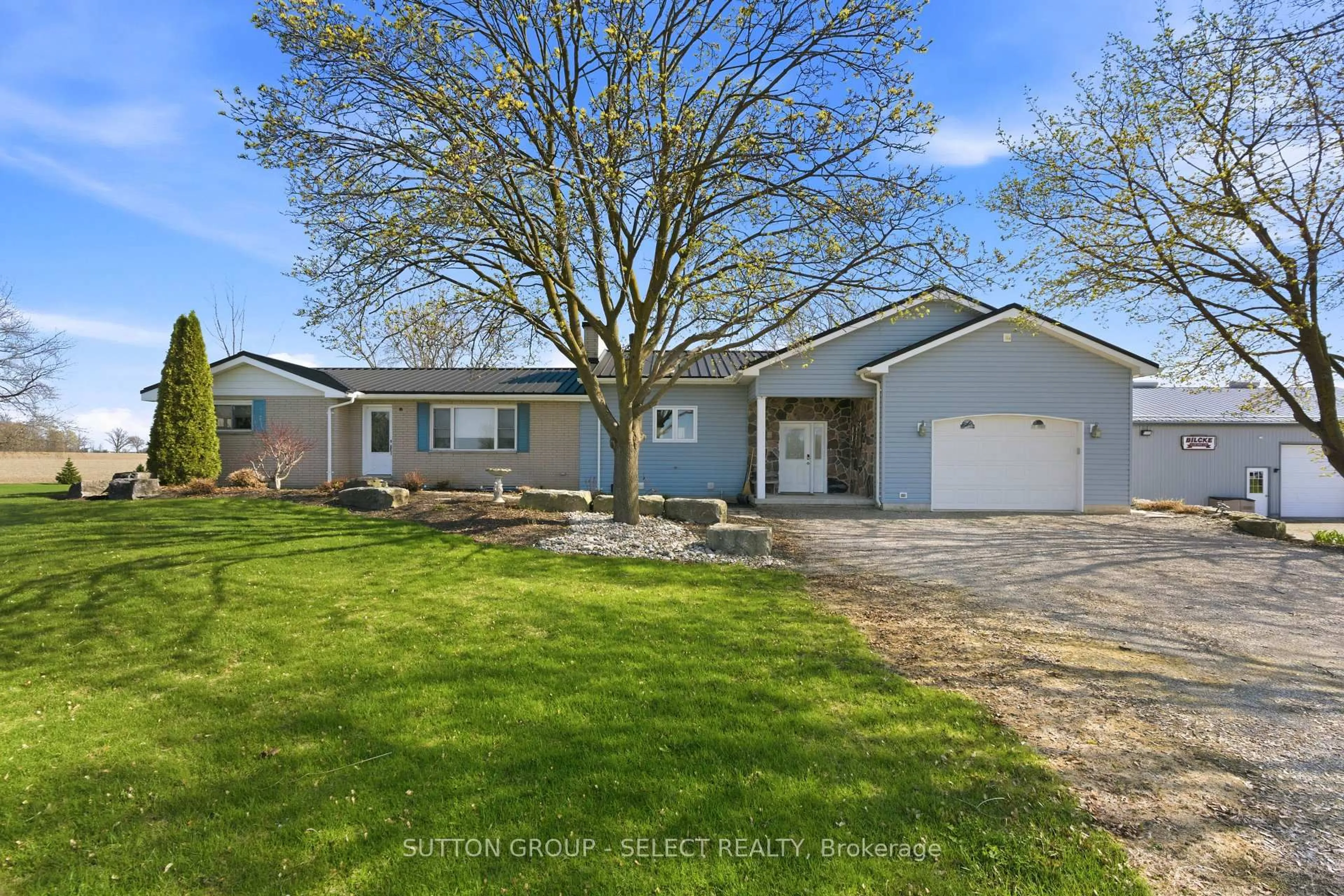 A pic from outside/outdoor area/front of a property/back of a property/a pic from drone, street for 40987 Kirkton Rd, South Huron Ontario N0M 1S5