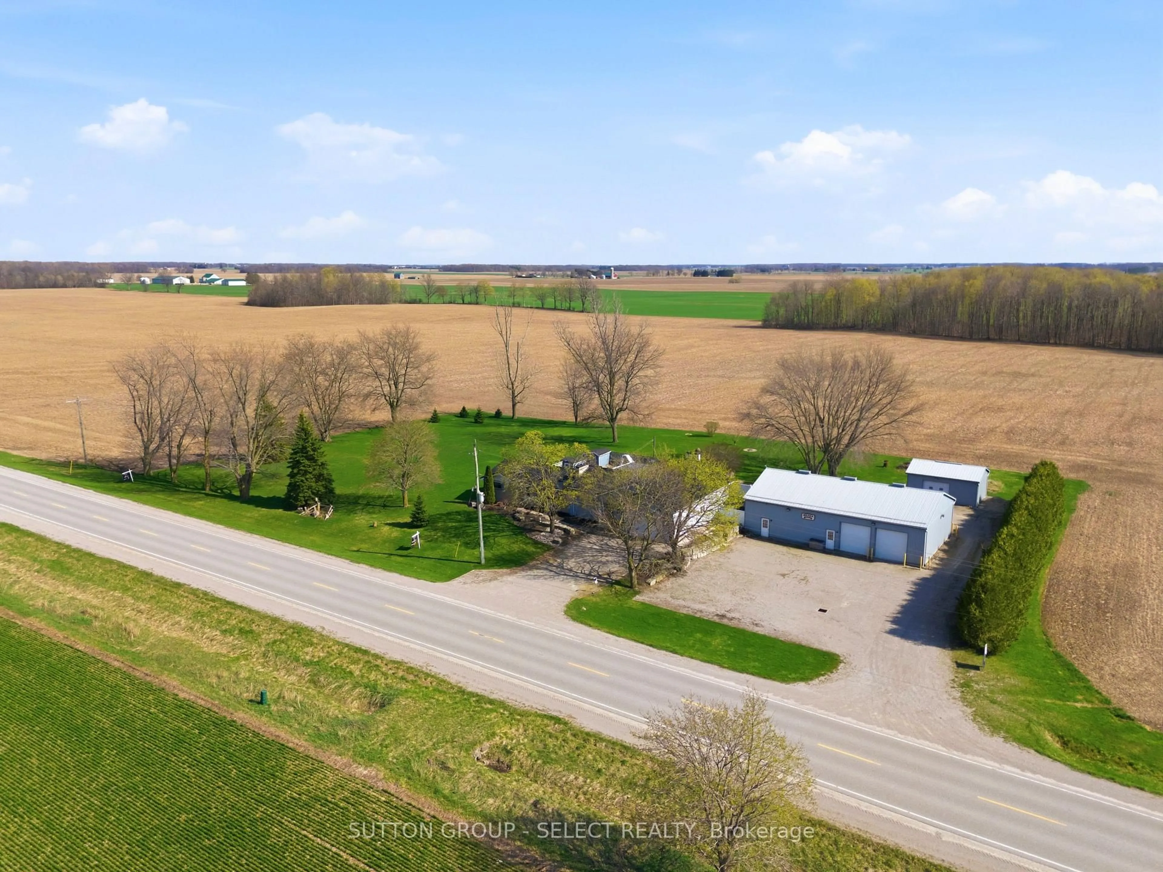 A pic from outside/outdoor area/front of a property/back of a property/a pic from drone, street for 40987 Kirkton Rd, South Huron Ontario N0M 1S5