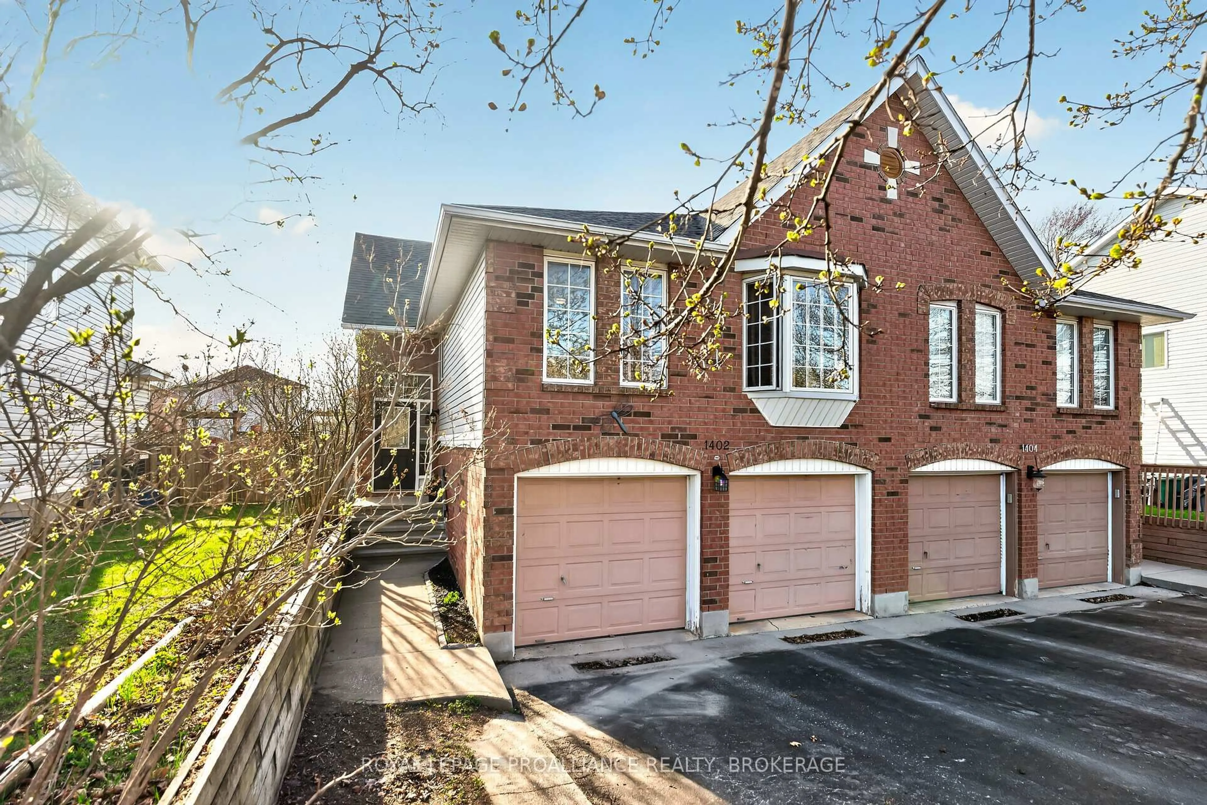 Home with brick exterior material, street for 1402 Thornwood Cres, Kingston Ontario K7P 3B6