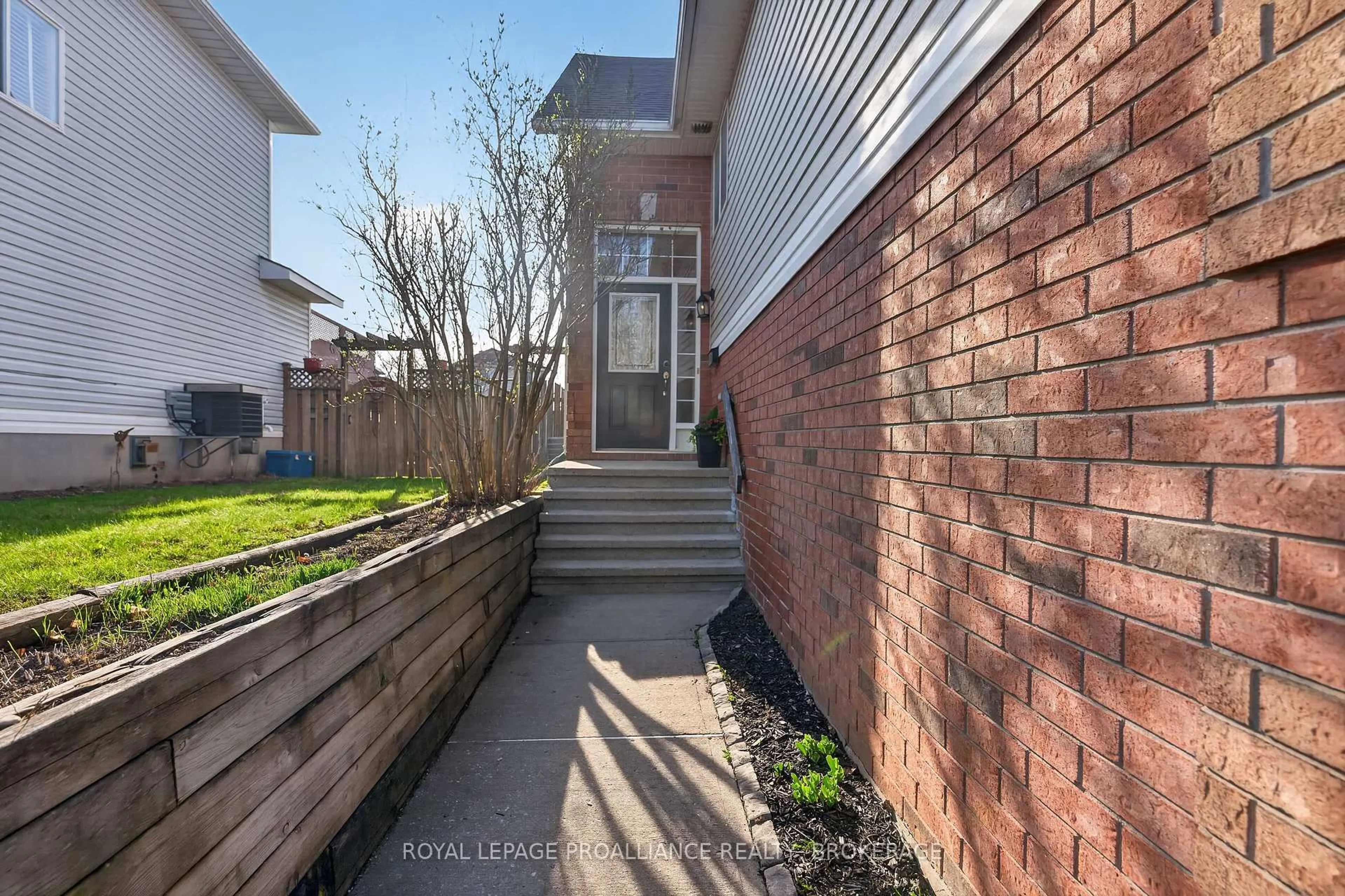 Home with brick exterior material, street for 1402 Thornwood Cres, Kingston Ontario K7P 3B6