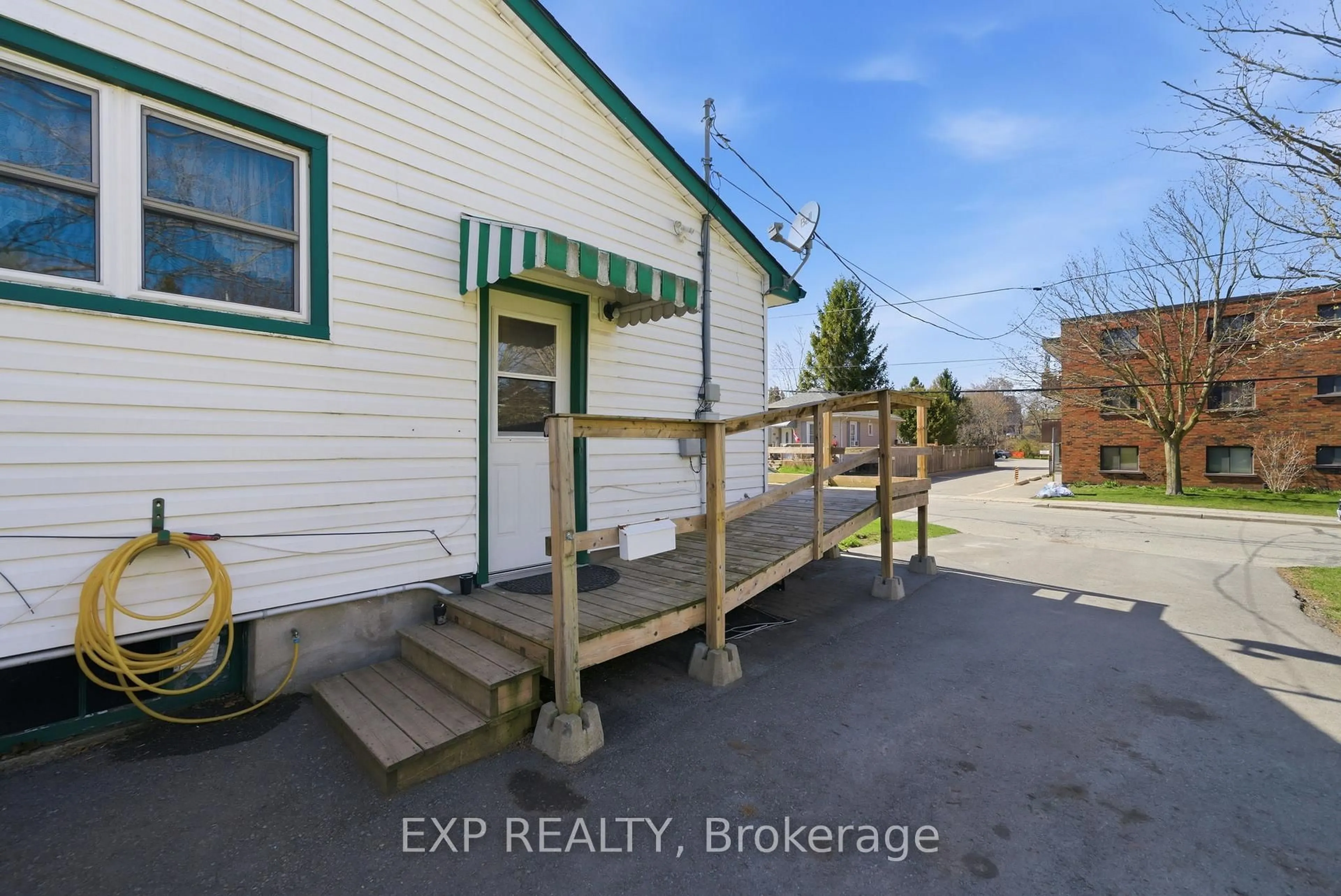 A pic from outside/outdoor area/front of a property/back of a property/a pic from drone, unknown for 35-37 Park St, Cobourg Ontario K9A 2E2