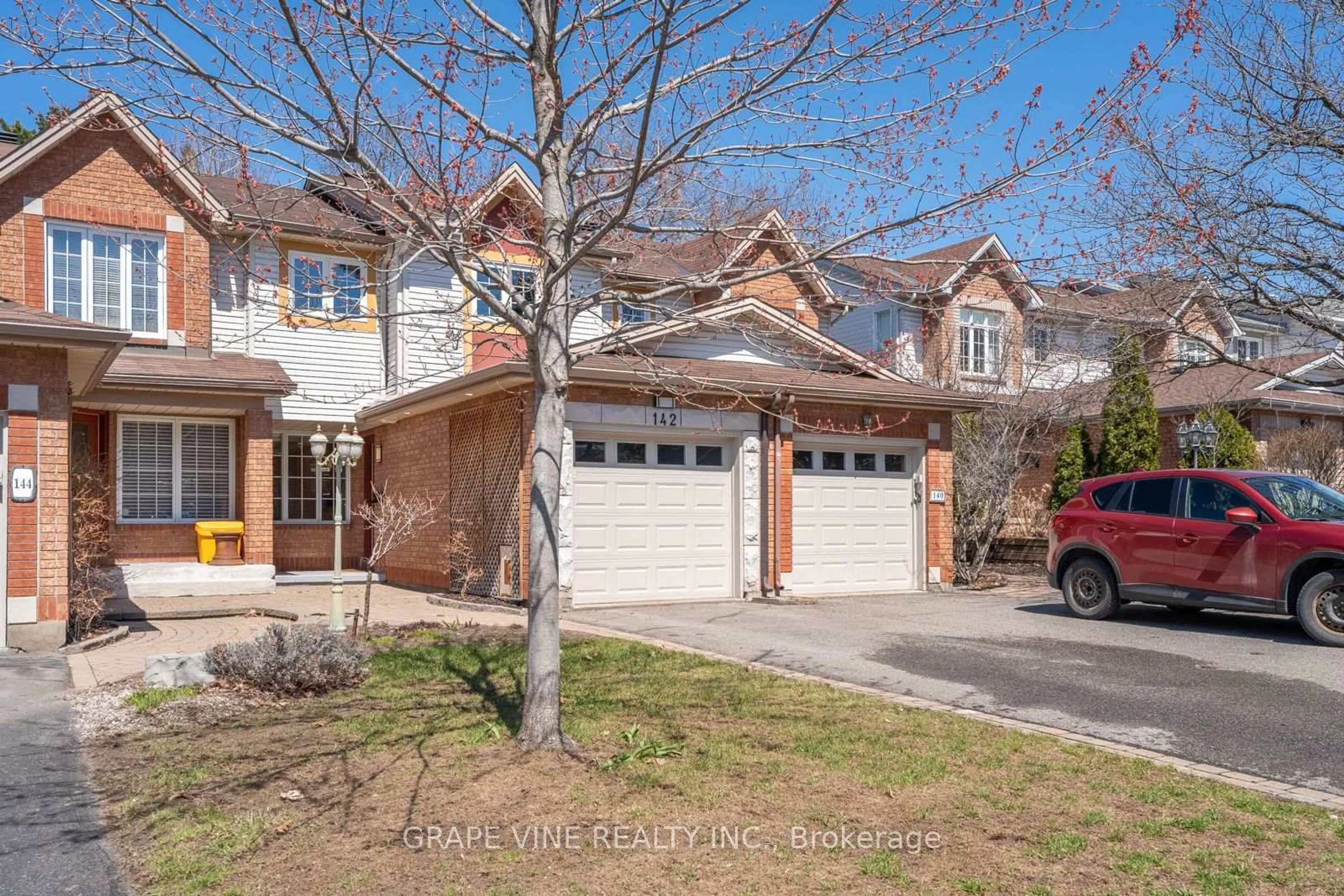 Home with brick exterior material, street for 142 College Circ, Ottawa Ontario K1K 4S1