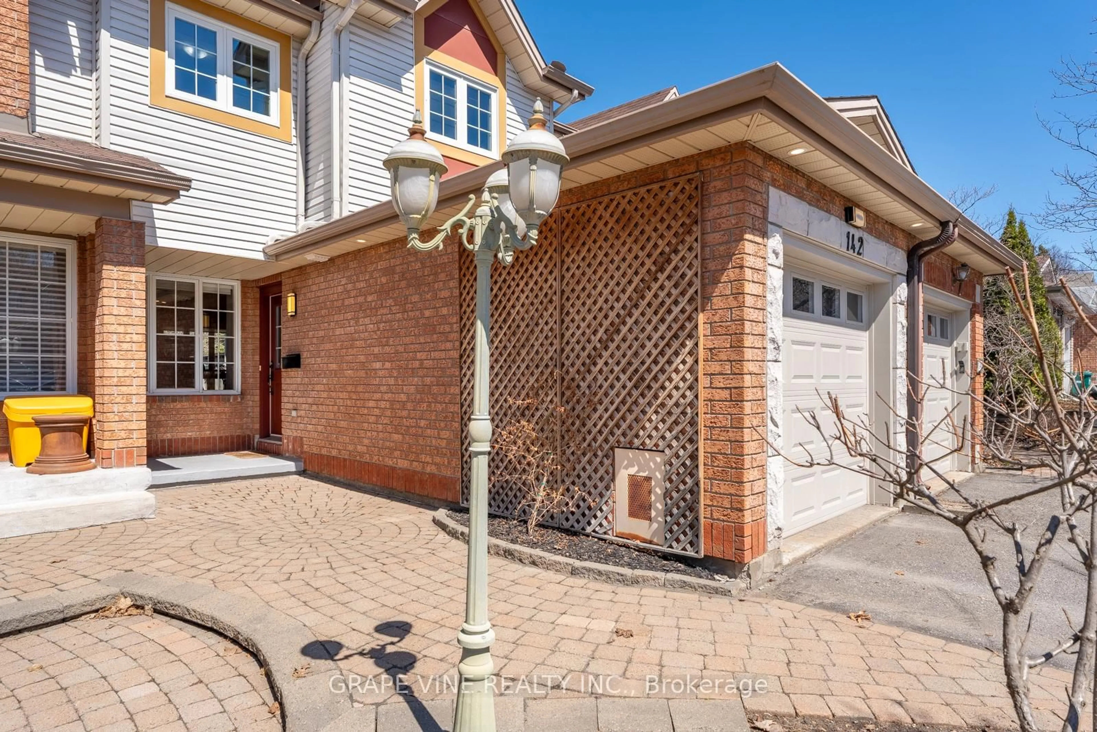 Home with brick exterior material, street for 142 College Circ, Ottawa Ontario K1K 4S1