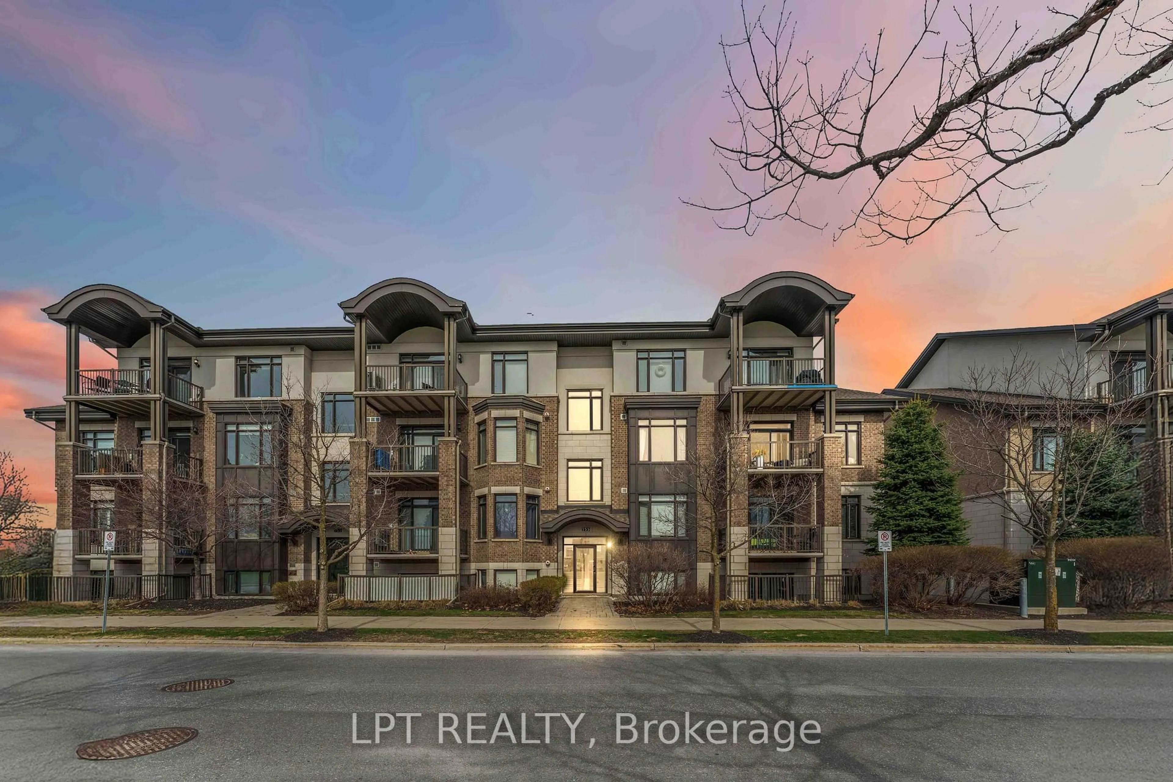 A pic from outside/outdoor area/front of a property/back of a property/a pic from drone, building for 755 Beauparc Private #301, Ottawa Ontario K1J 0B5