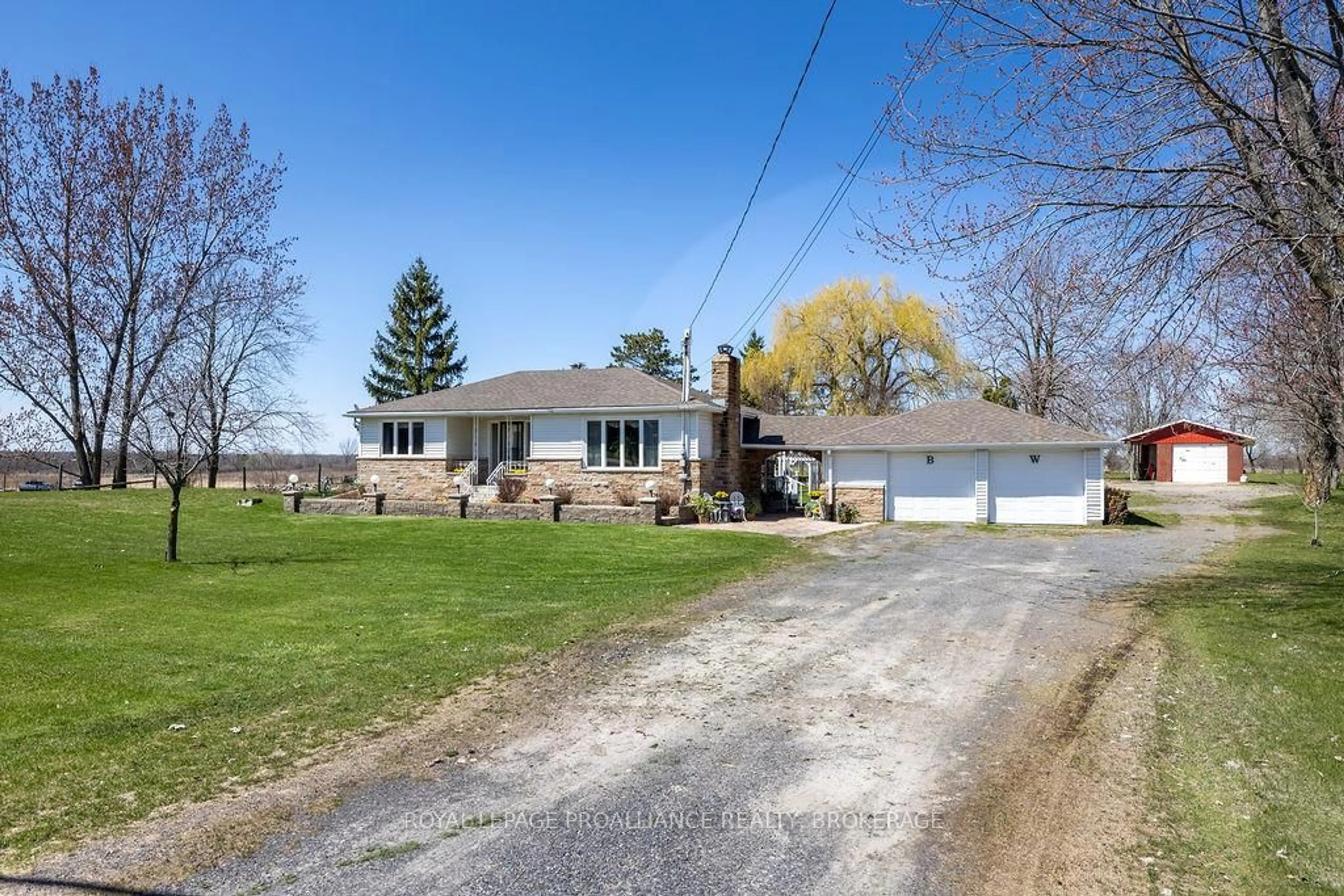 A pic from outside/outdoor area/front of a property/back of a property/a pic from drone, street for 2854 Highway 15, Kingston Ontario K7L 4V3