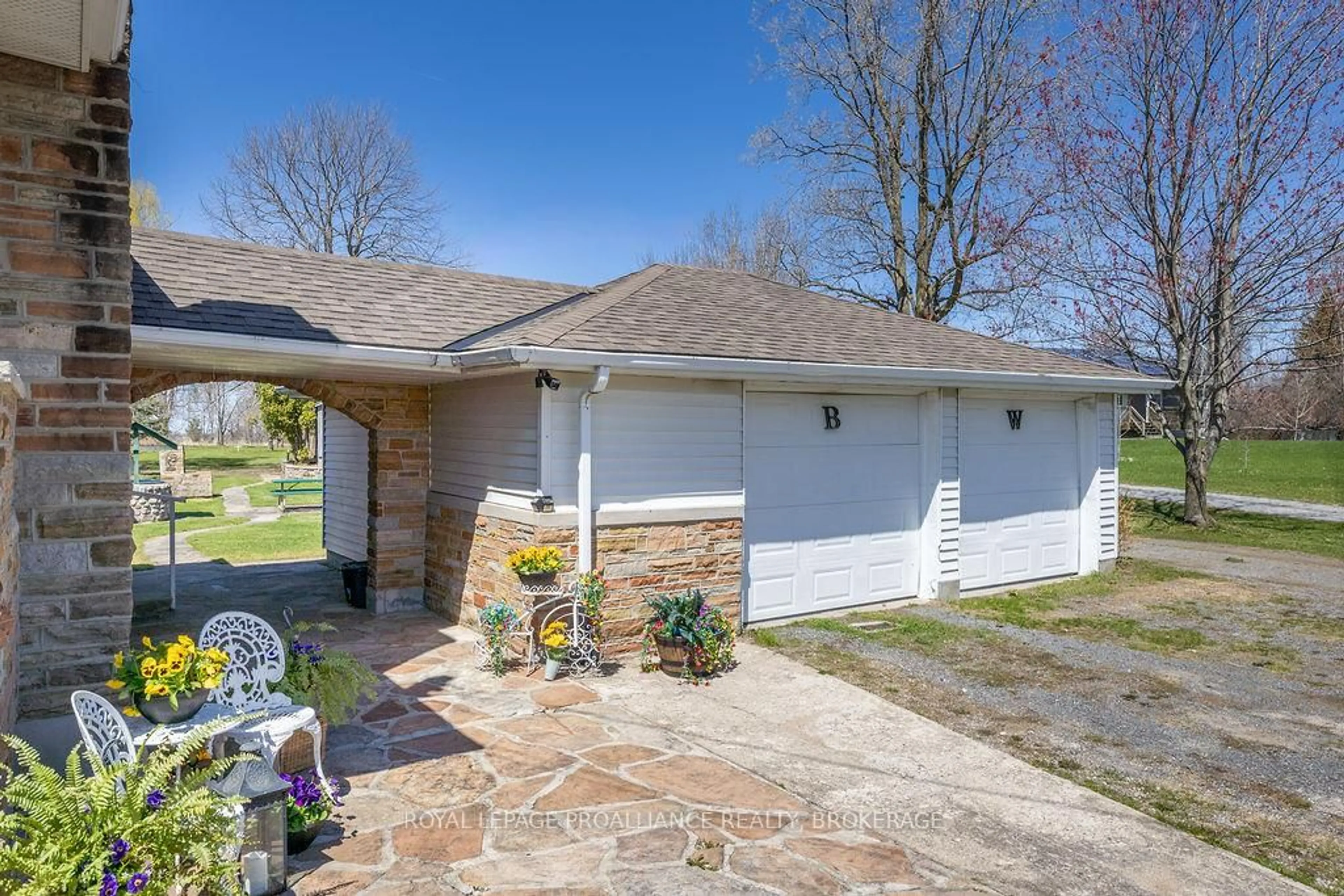 A pic from outside/outdoor area/front of a property/back of a property/a pic from drone, street for 2854 Highway 15, Kingston Ontario K7L 4V3