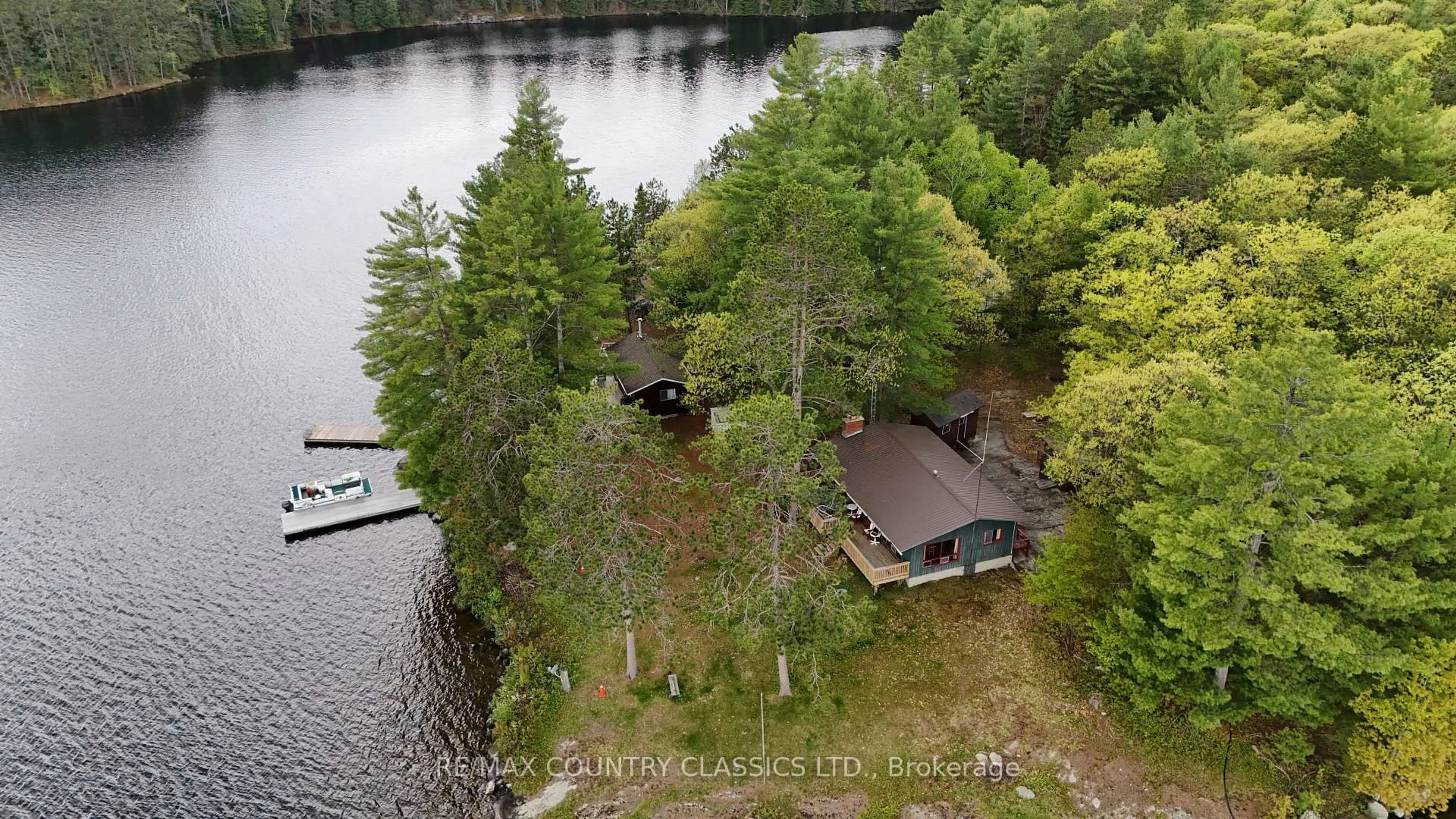 A pic from outside/outdoor area/front of a property/back of a property/a pic from drone, water/lake/river/ocean view for 910 Weslemkoon Lake, Addington Highlands Ontario K0L 2M0