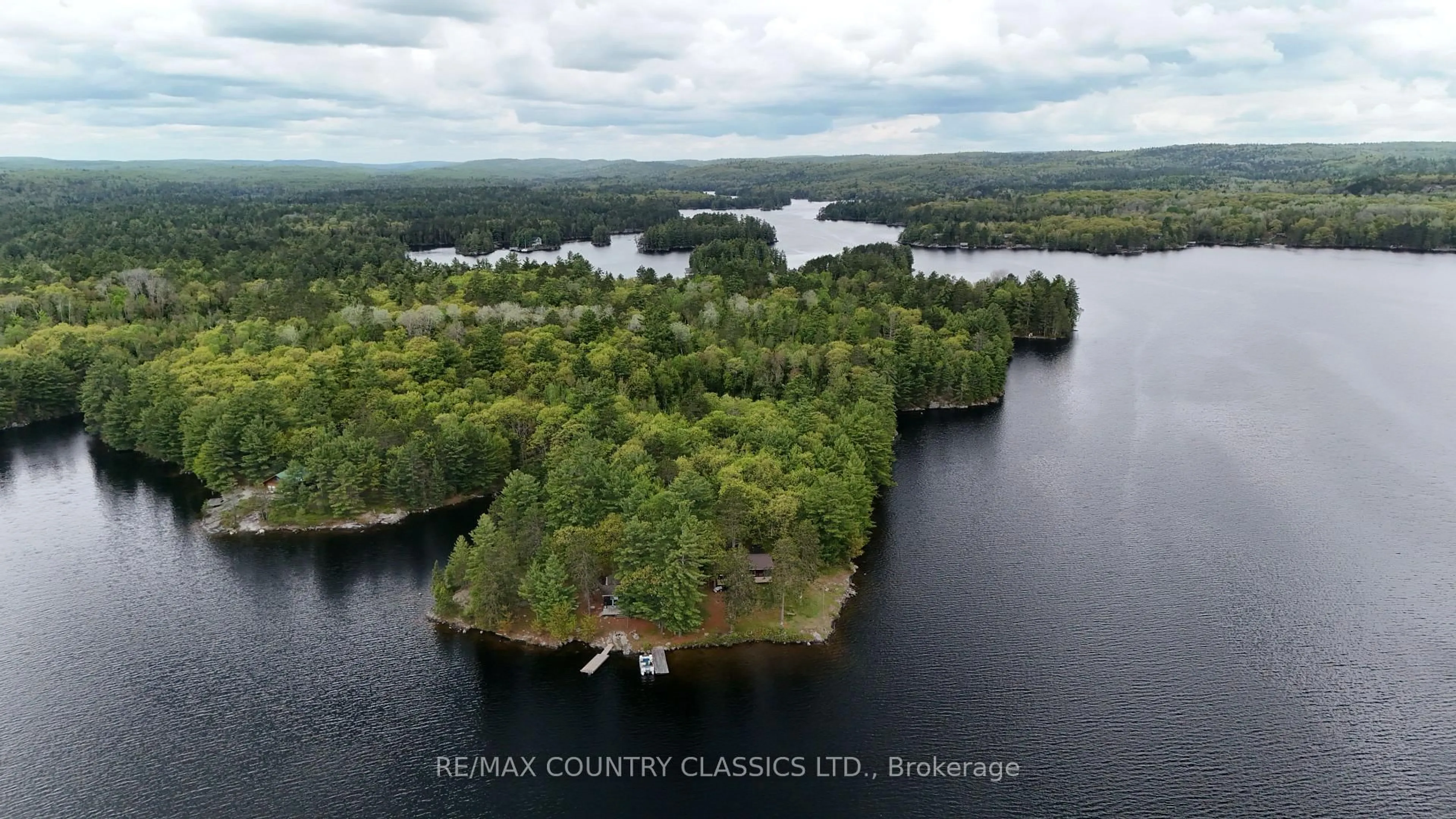 A pic from outside/outdoor area/front of a property/back of a property/a pic from drone, water/lake/river/ocean view for 910 Weslemkoon Lake, Addington Highlands Ontario K0L 2M0