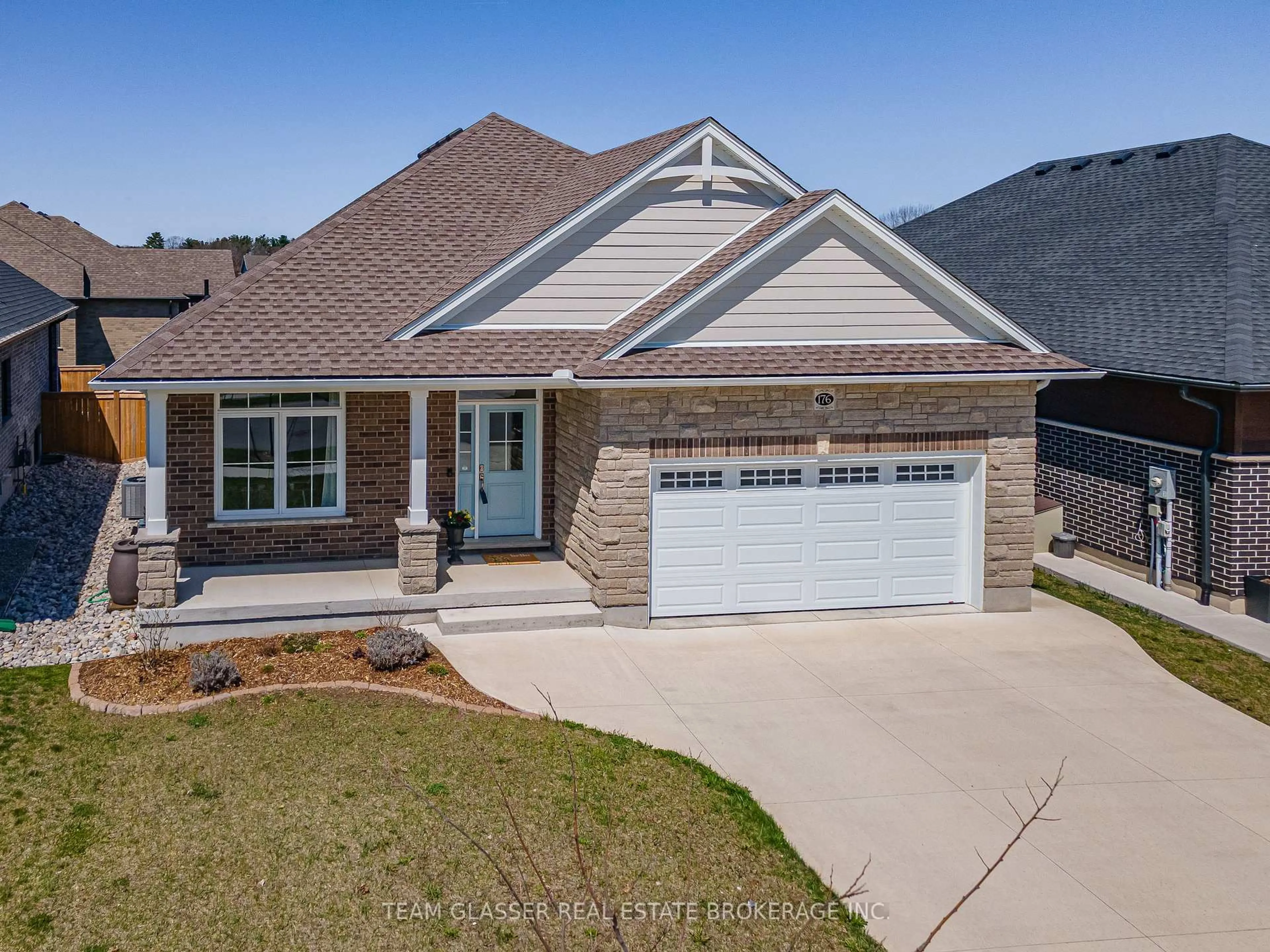 Home with brick exterior material, street for 176 BOARDWALK Way, Thames Centre Ontario N0L 1G2