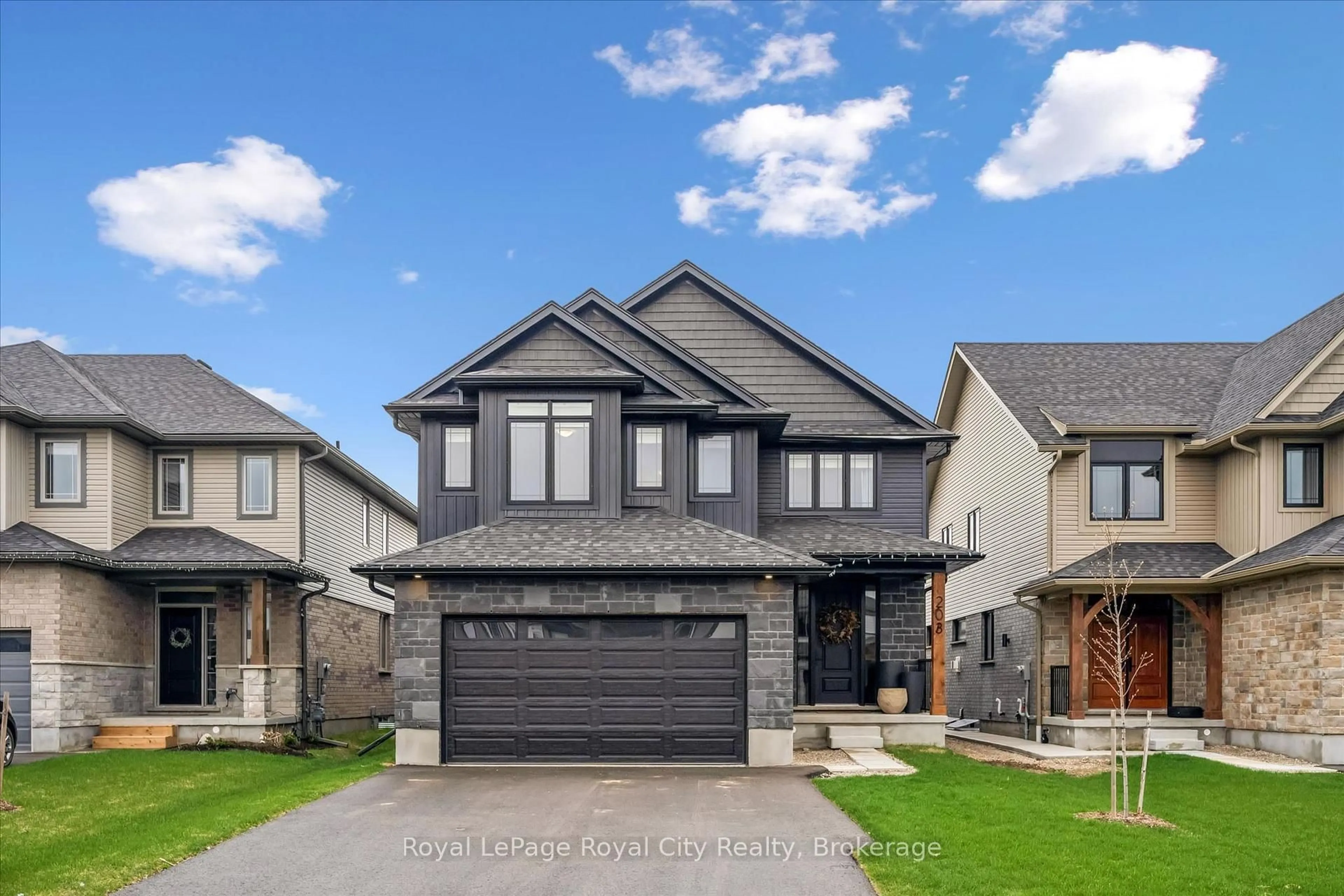 Home with brick exterior material, street for 203 Schmidt Dr, Wellington North Ontario N0G 1A0