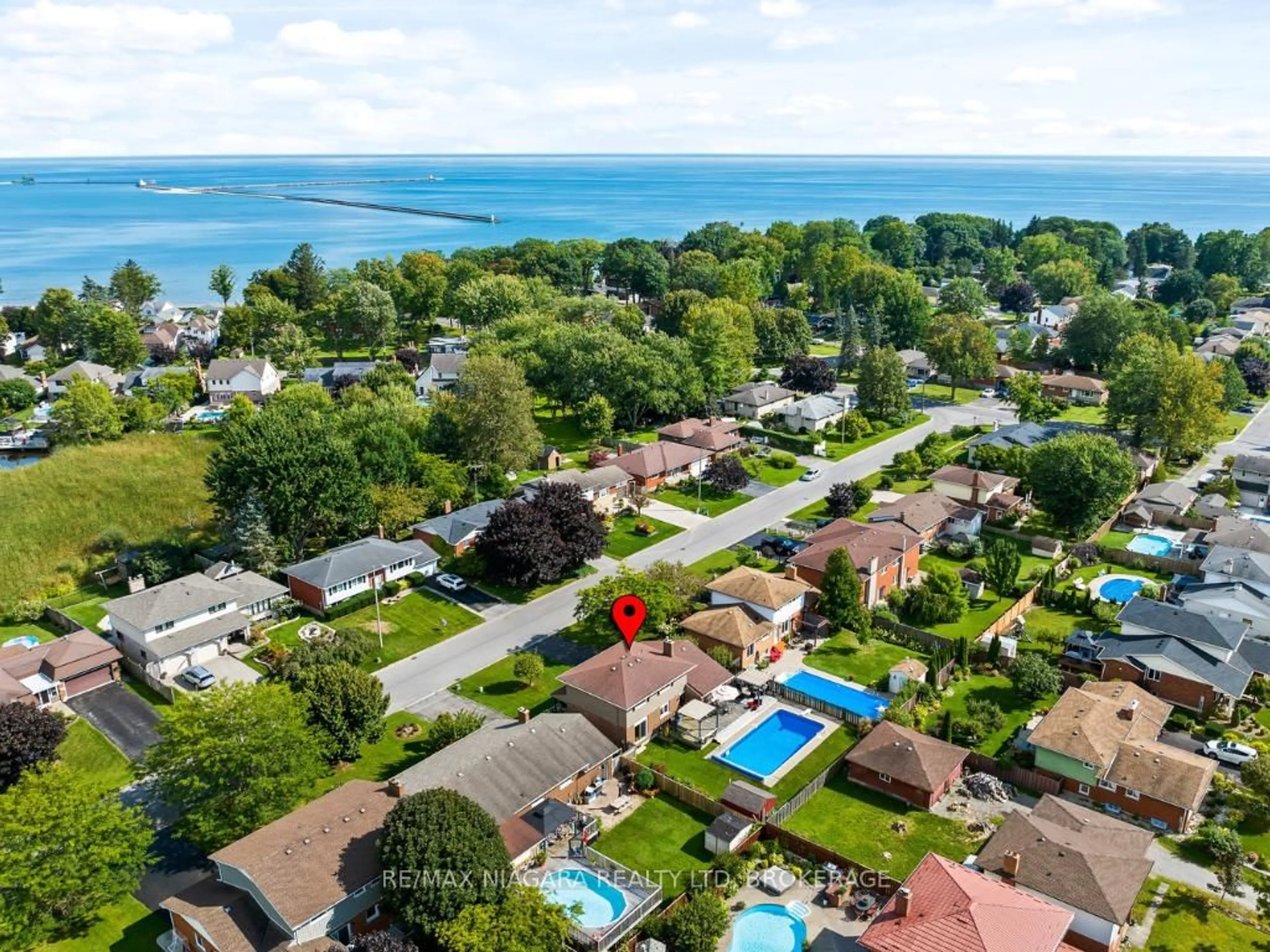 A pic from outside/outdoor area/front of a property/back of a property/a pic from drone, water/lake/river/ocean view for 40 Gaspare Dr, Port Colborne Ontario L3K 2V2