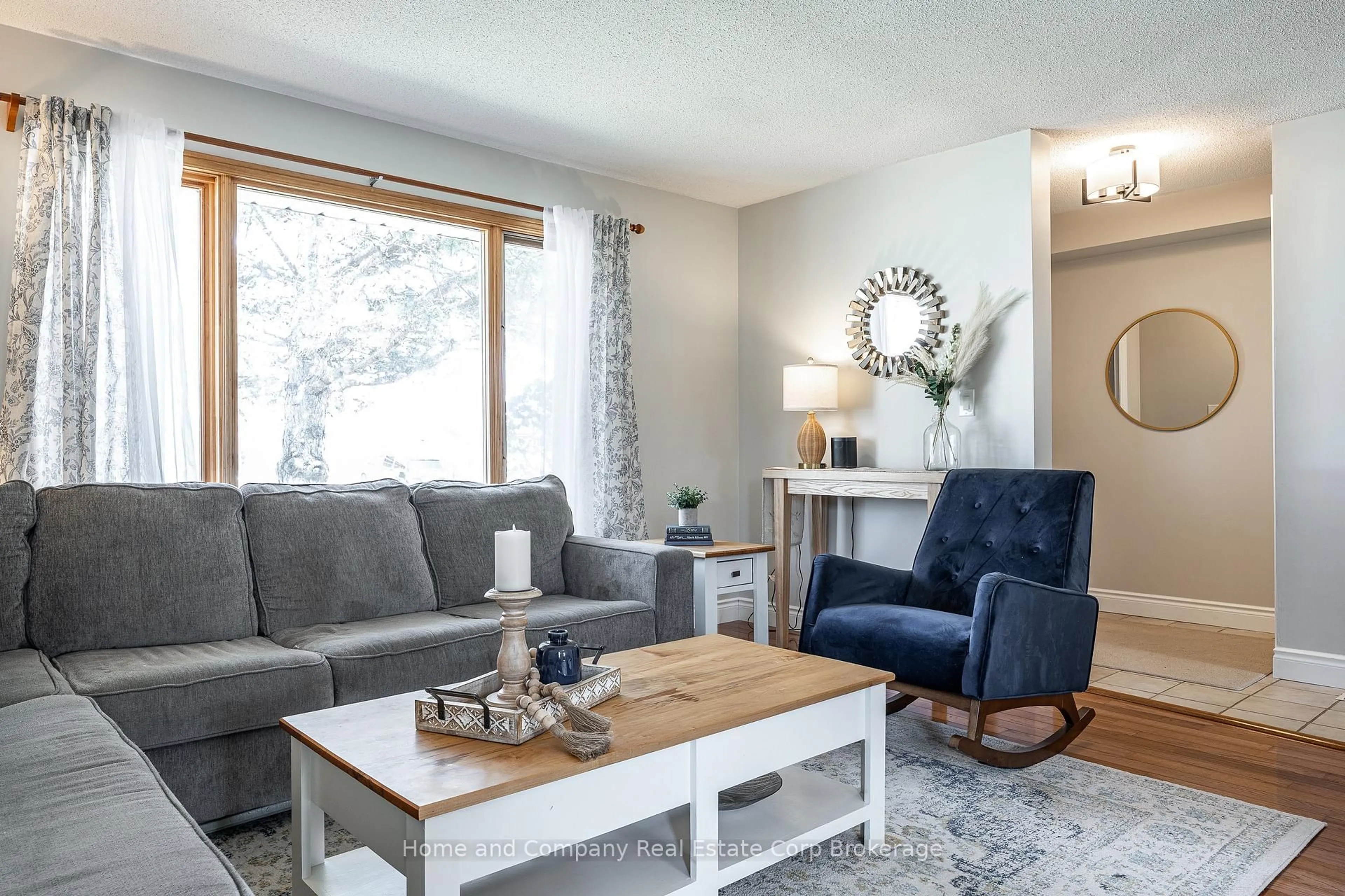 Living room with furniture, wood/laminate floor for 43 Mcgregor St, Stratford Ontario N4Z 1G5